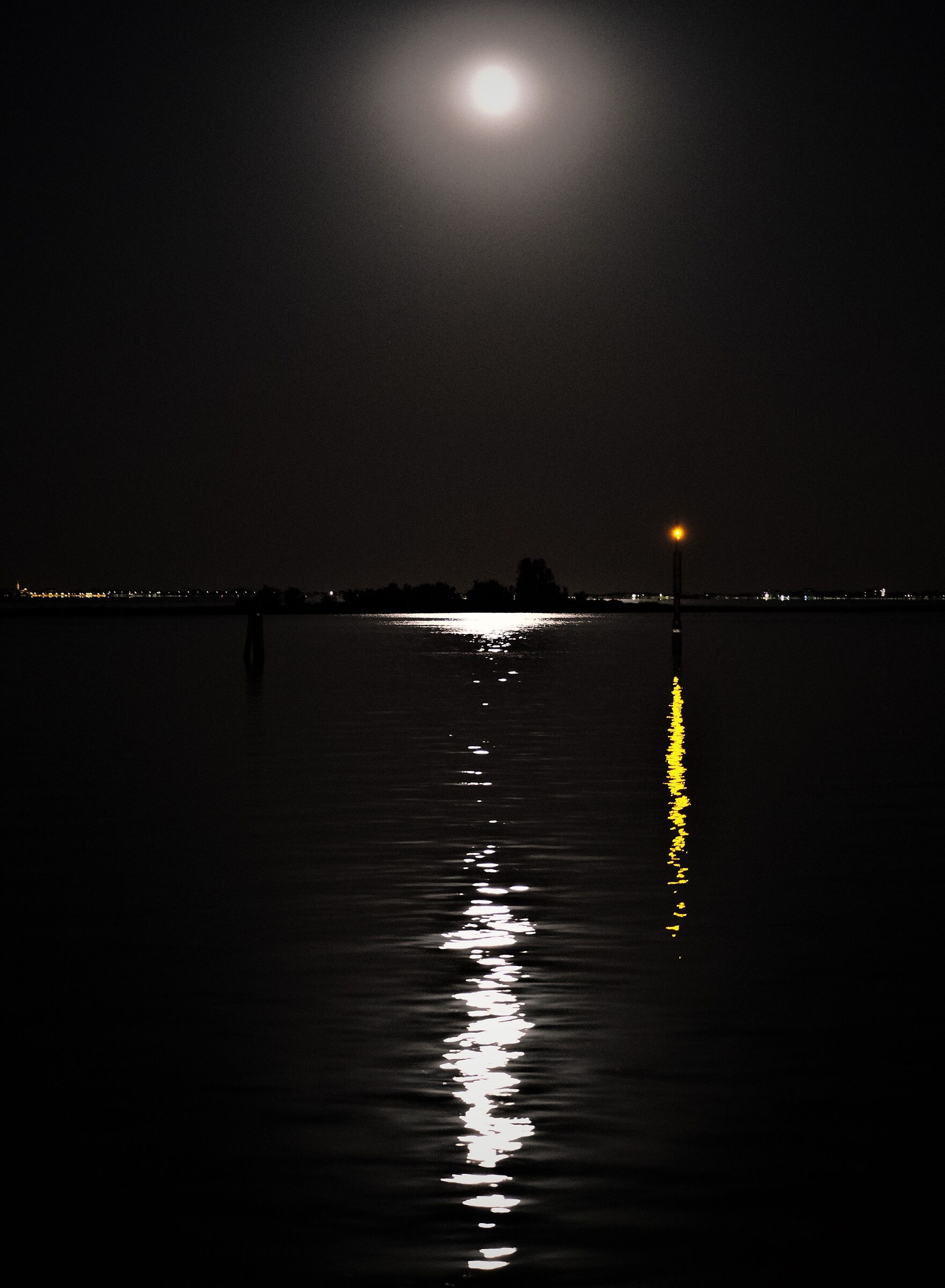 Mirrored moon on the sea
