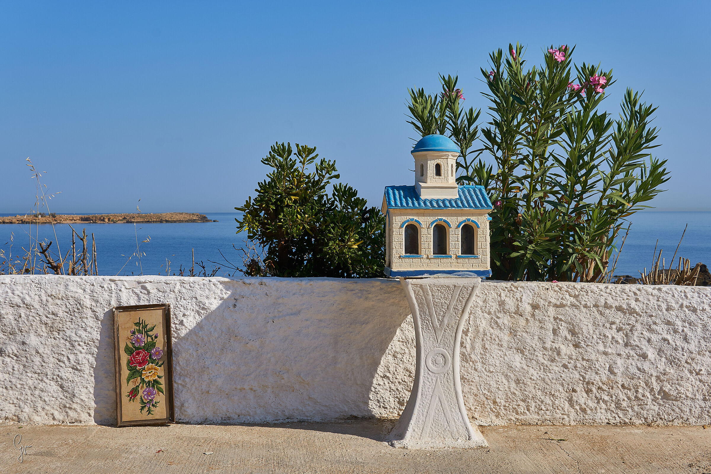 Sea wall and painting