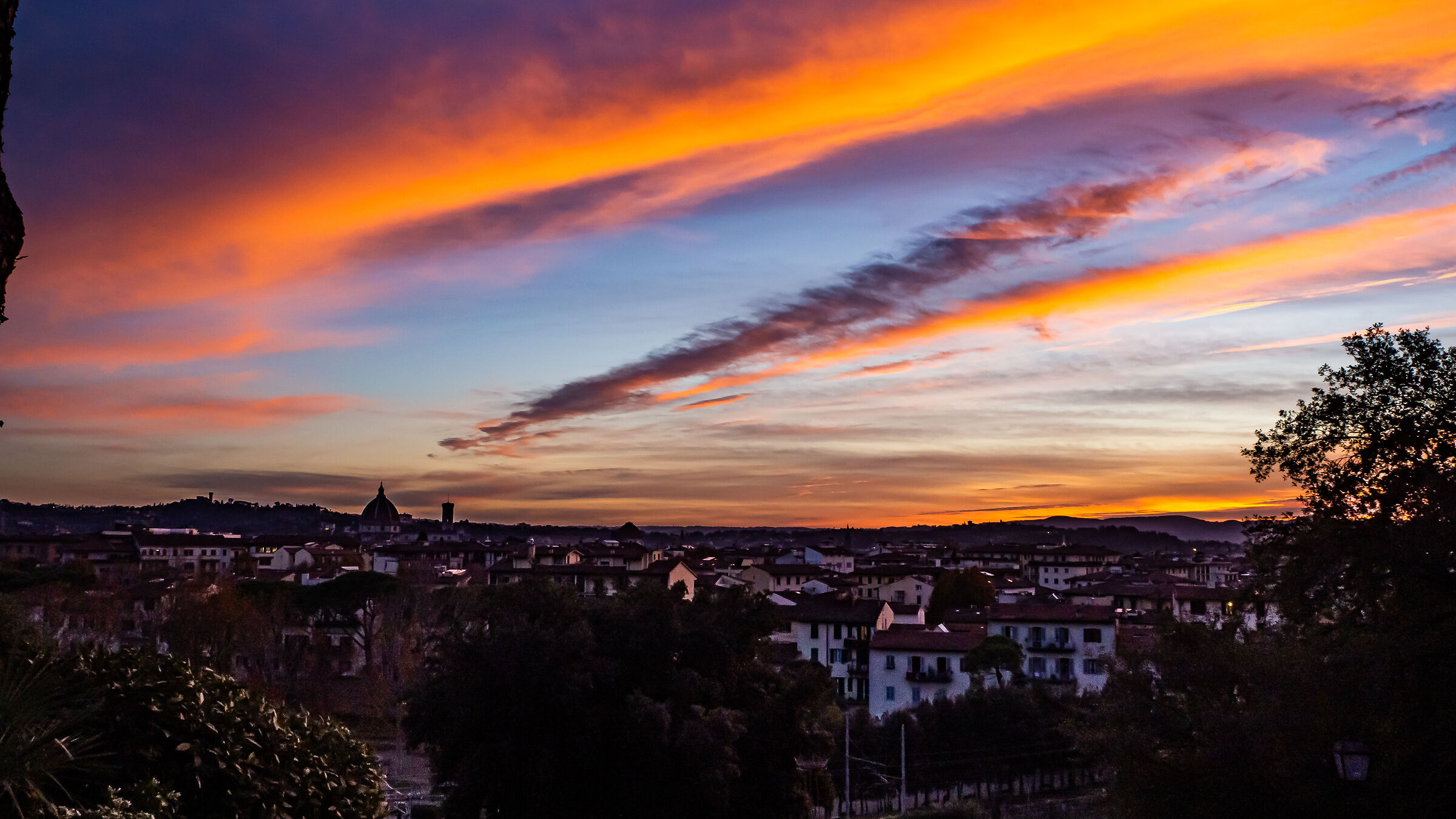 Fiery clouds in a sunset over Florence