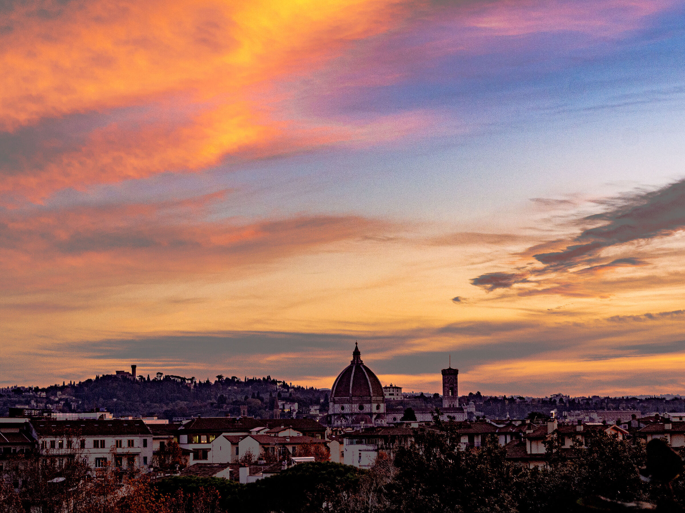 Fiery clouds in a sunset over Florence ll