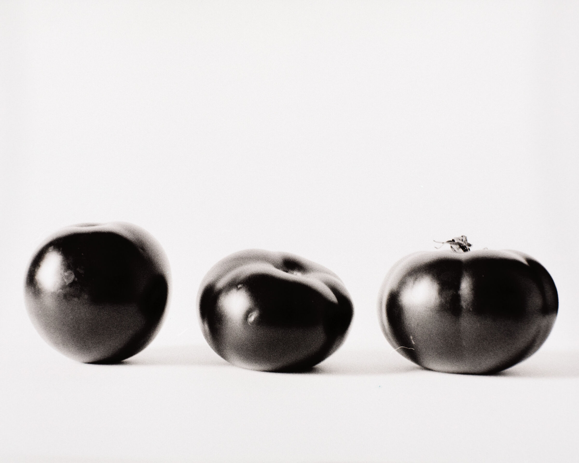 Trio di pomodori rossi