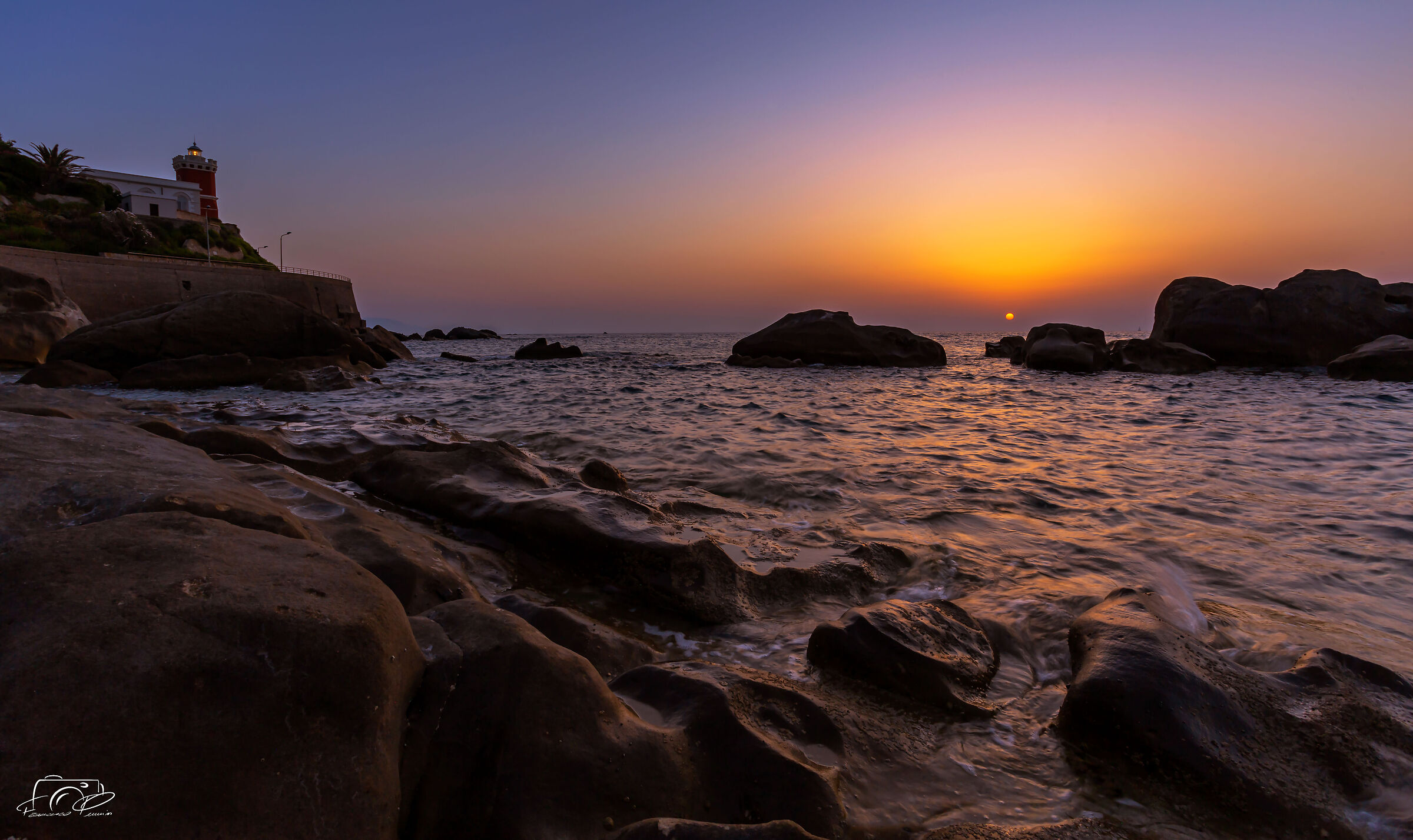 Sunset at the lighthouse of Capo D'Orlando (ME)