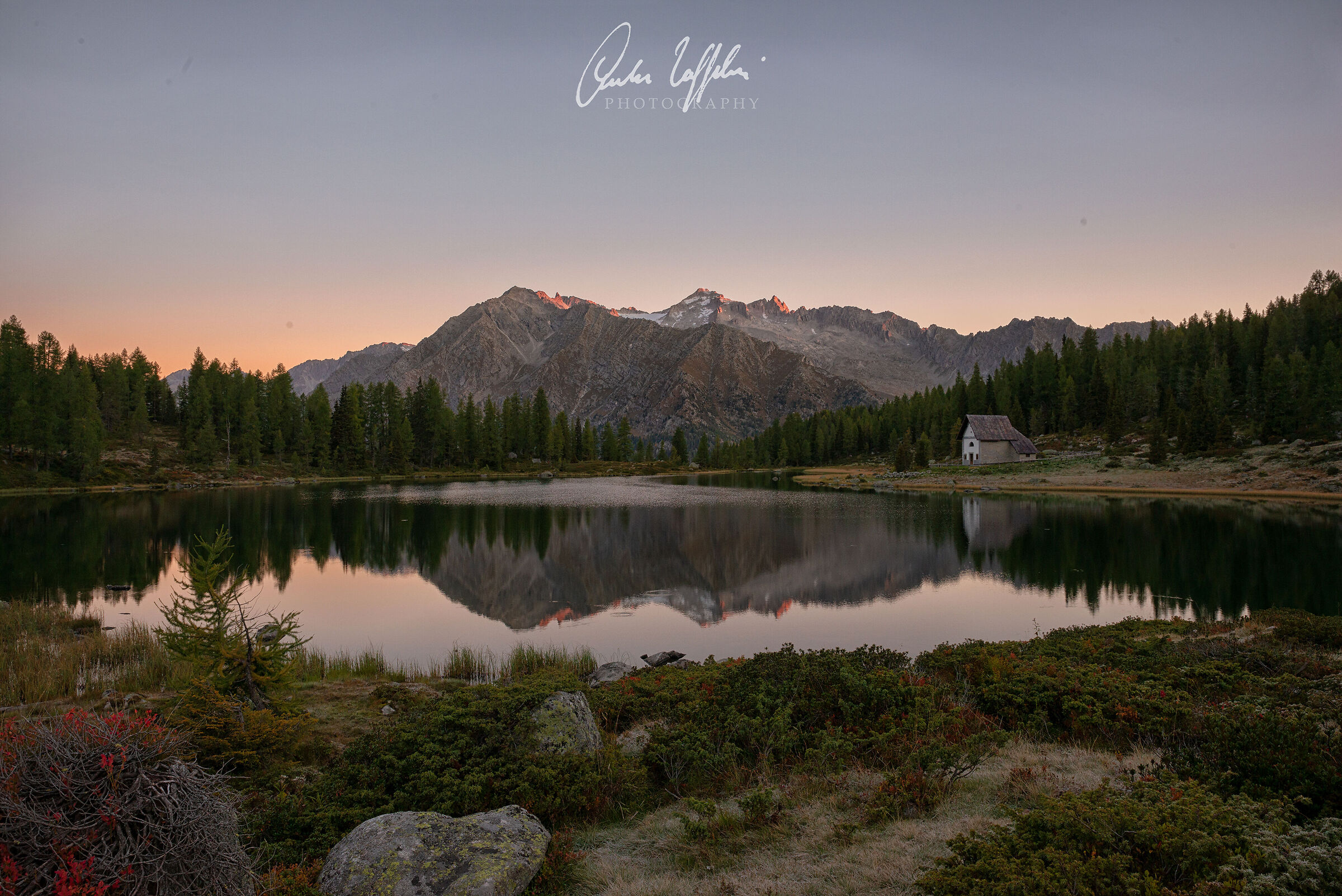 Sunrise on the top of Presanella