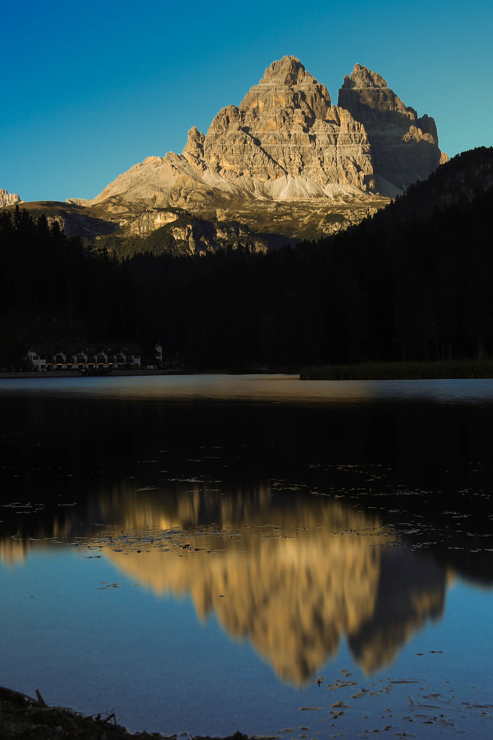 Three peaks of Lavaredo are reflected on Lake Misurina