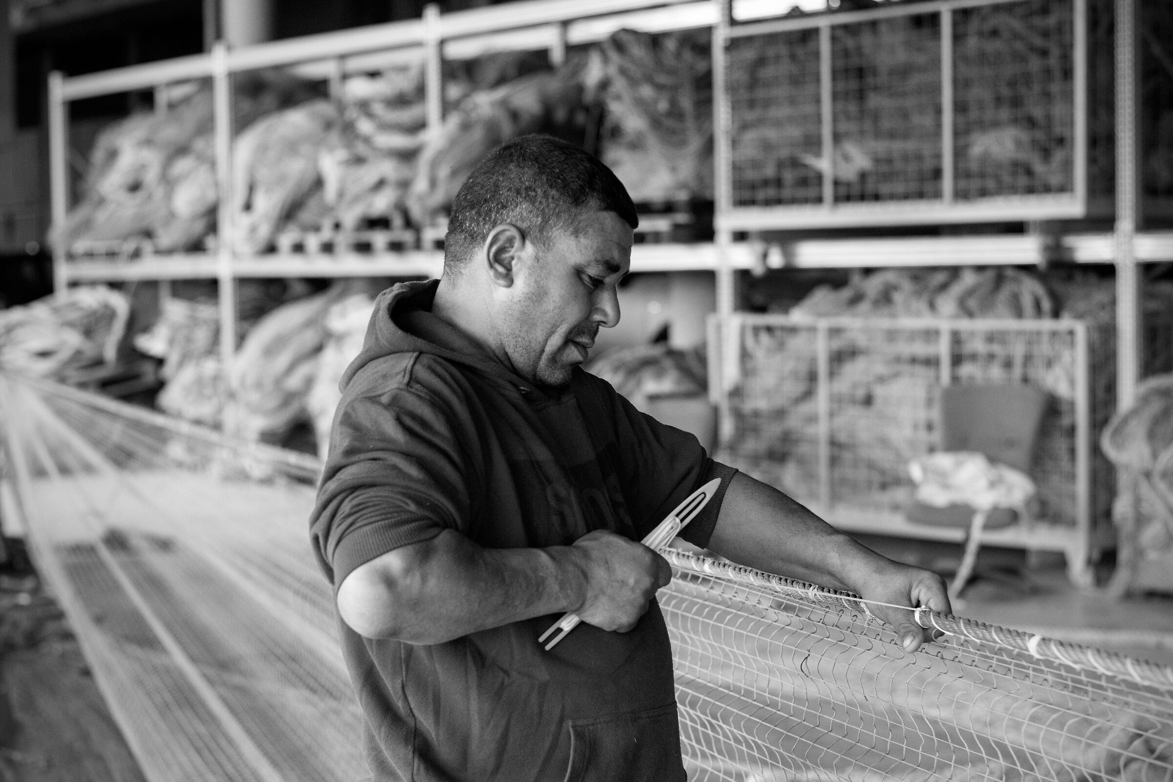 Riparazione rete da pesca