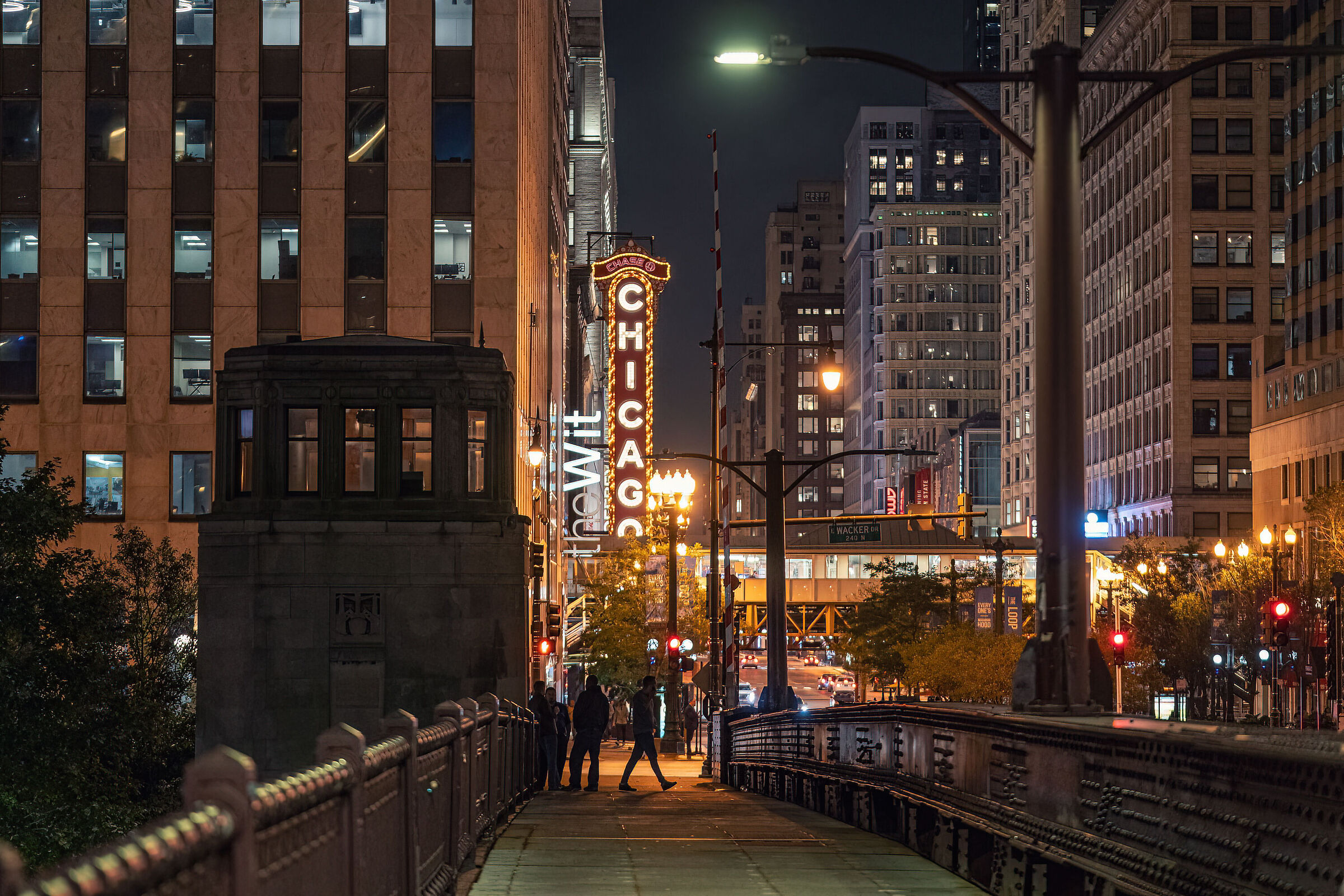 Night view of Chicago Theater sign from the bridge