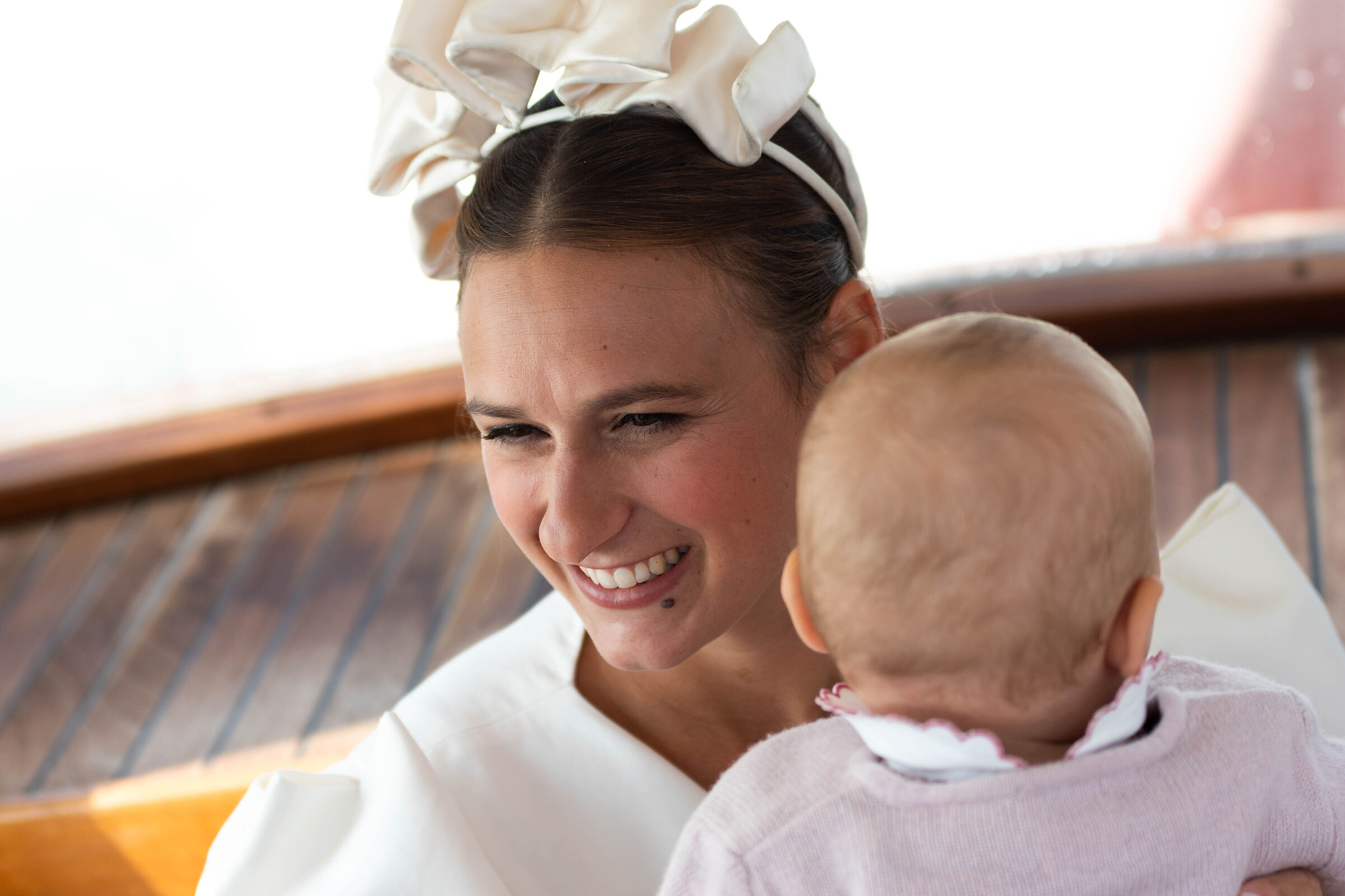 Bride and daughter on a boat in Venice