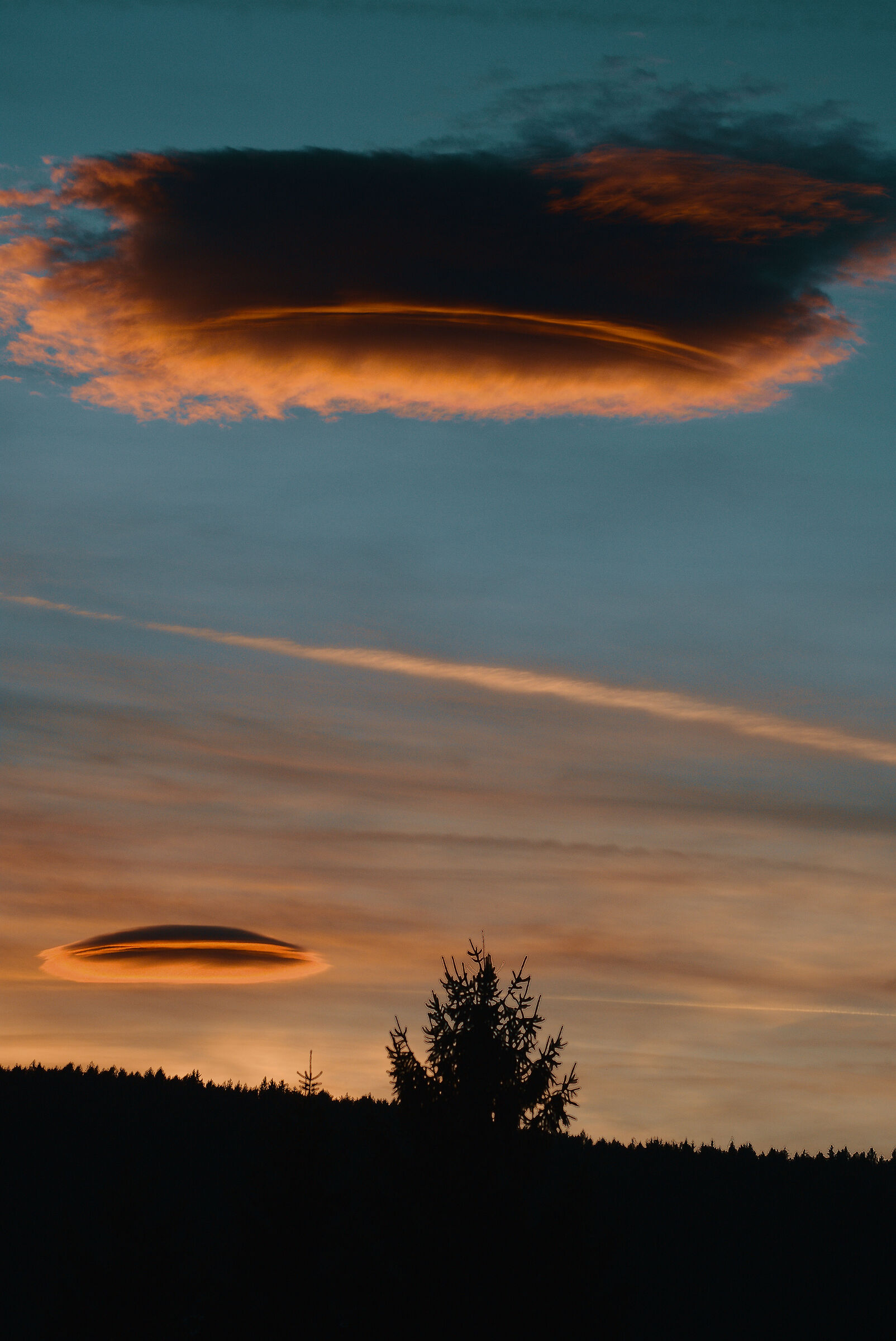 sunset in Bruneck with lenticular clouds