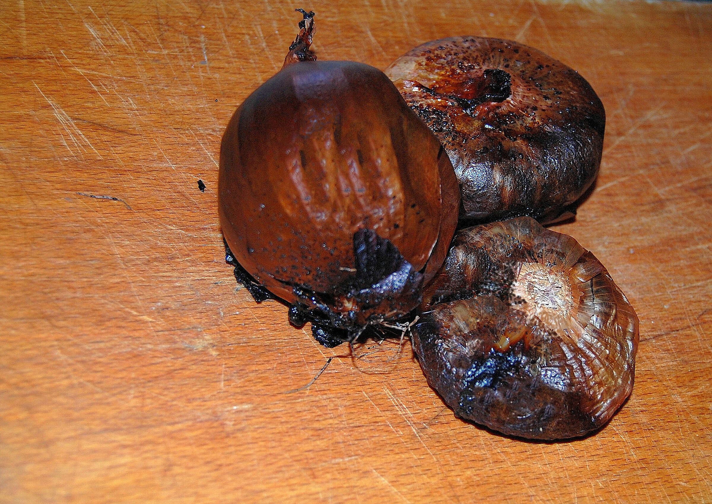 Baked onions on cutting board