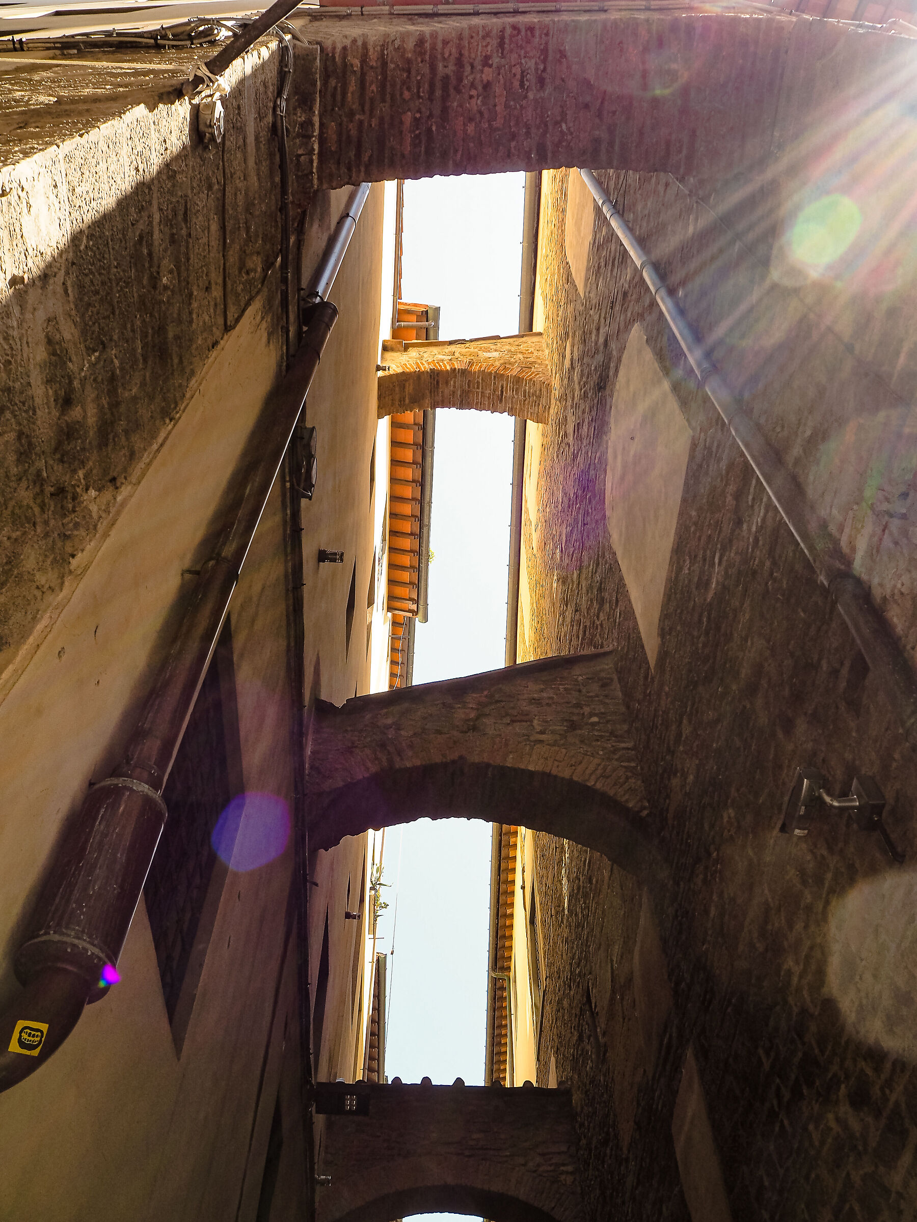 Play of light and arches in Florence