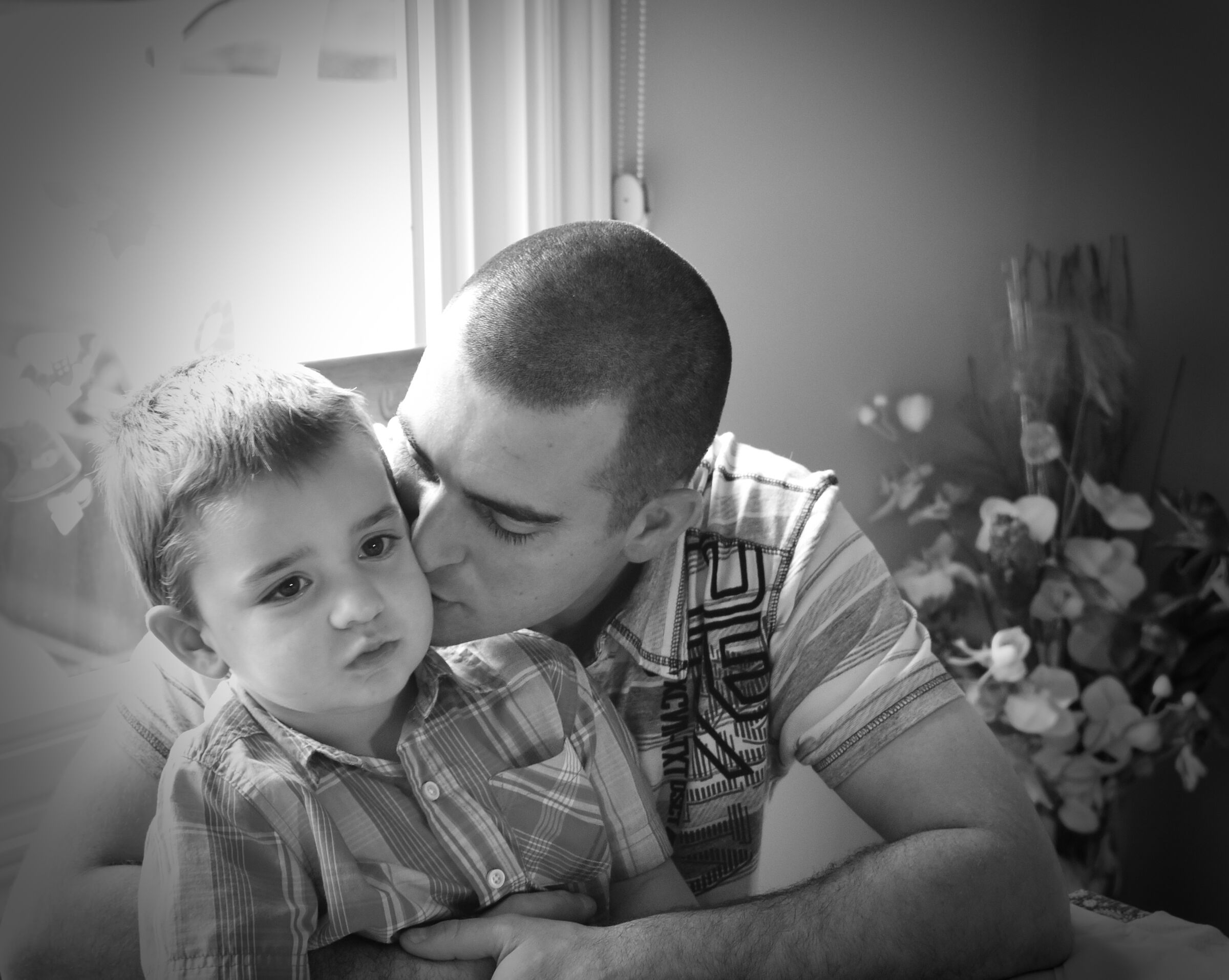 Moments between son and father at a party (4 year son)