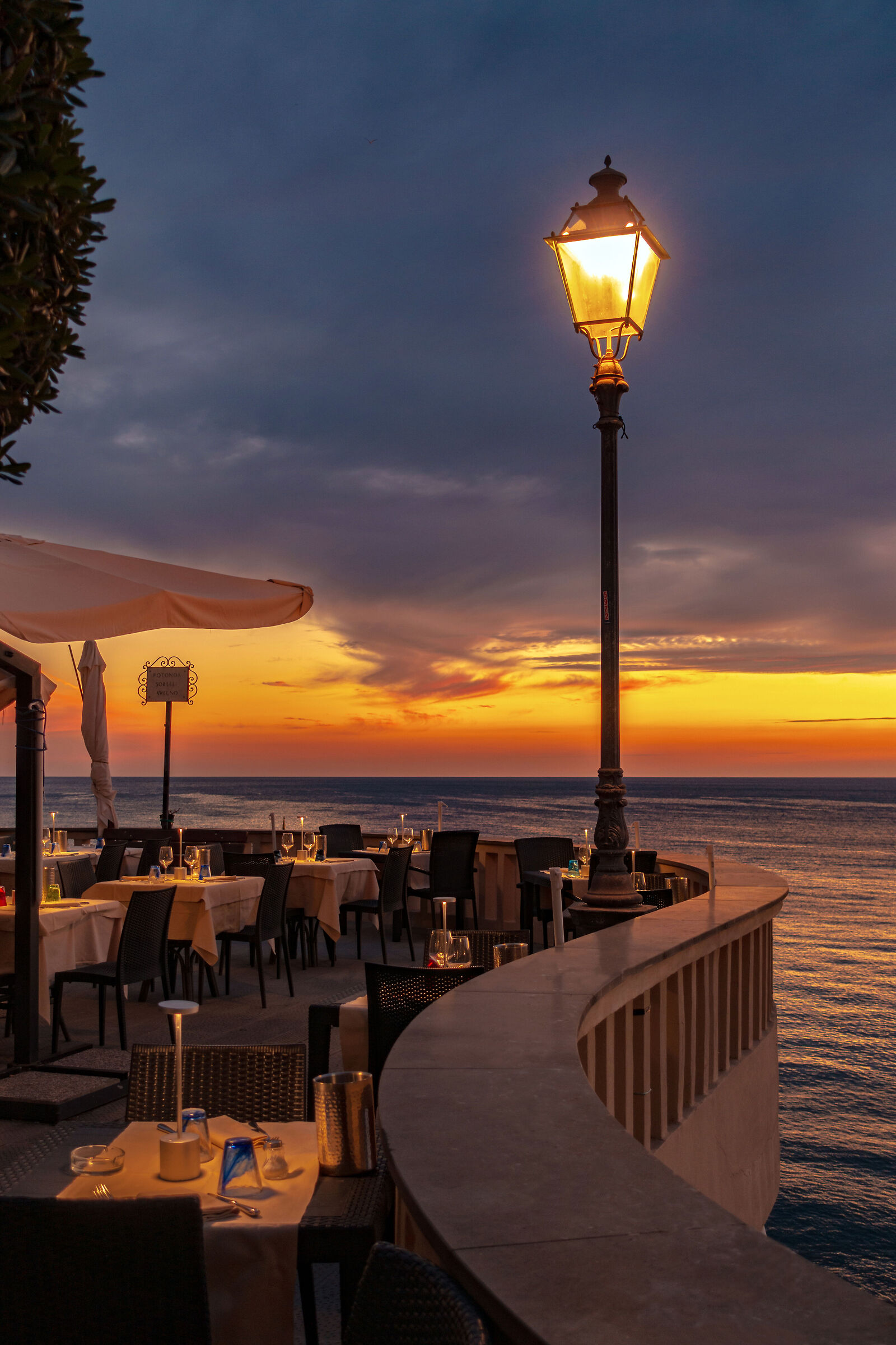 Terrace overlooking the sea at sunset