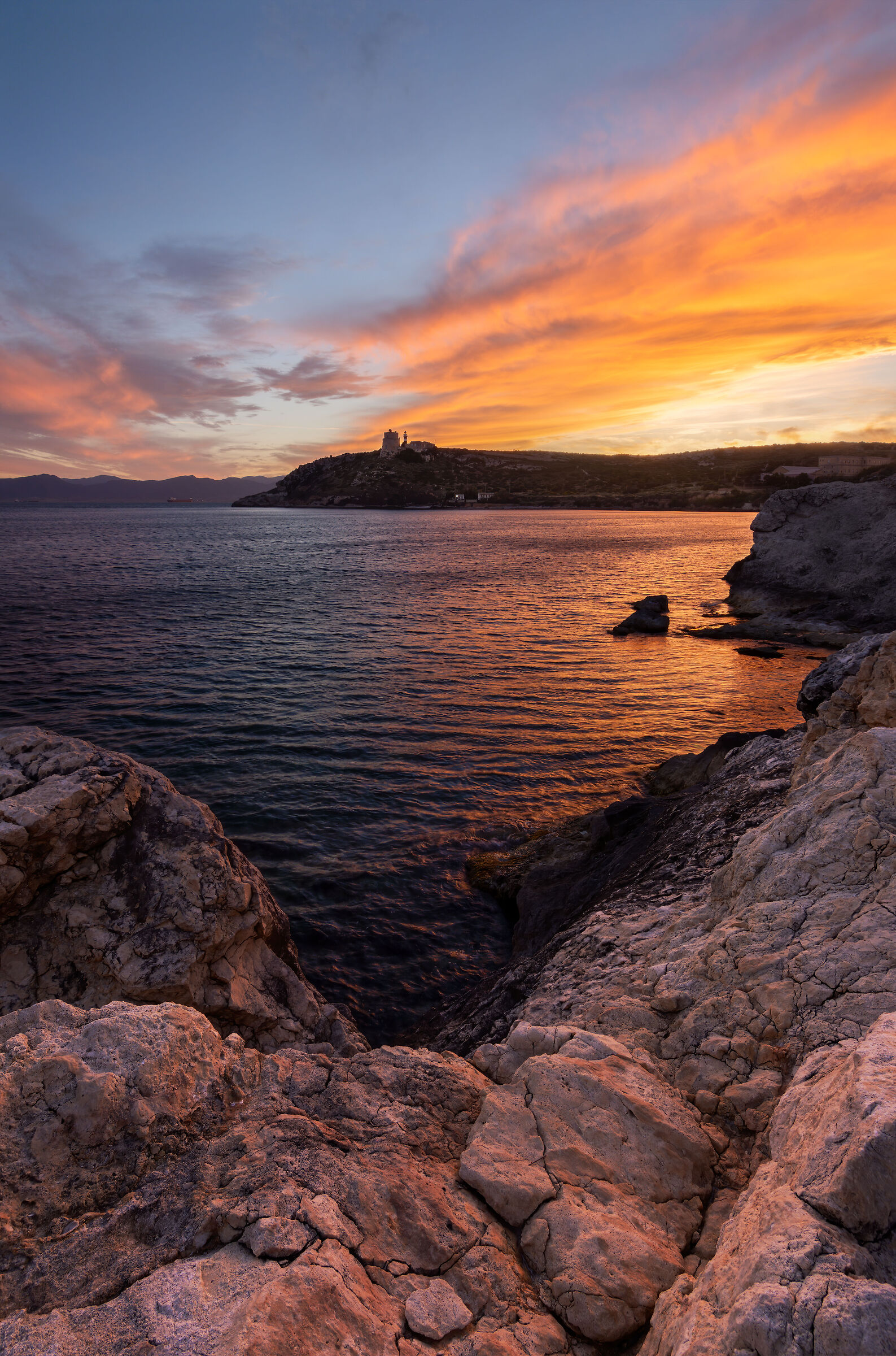 Calamosca Lighthouse at sunset