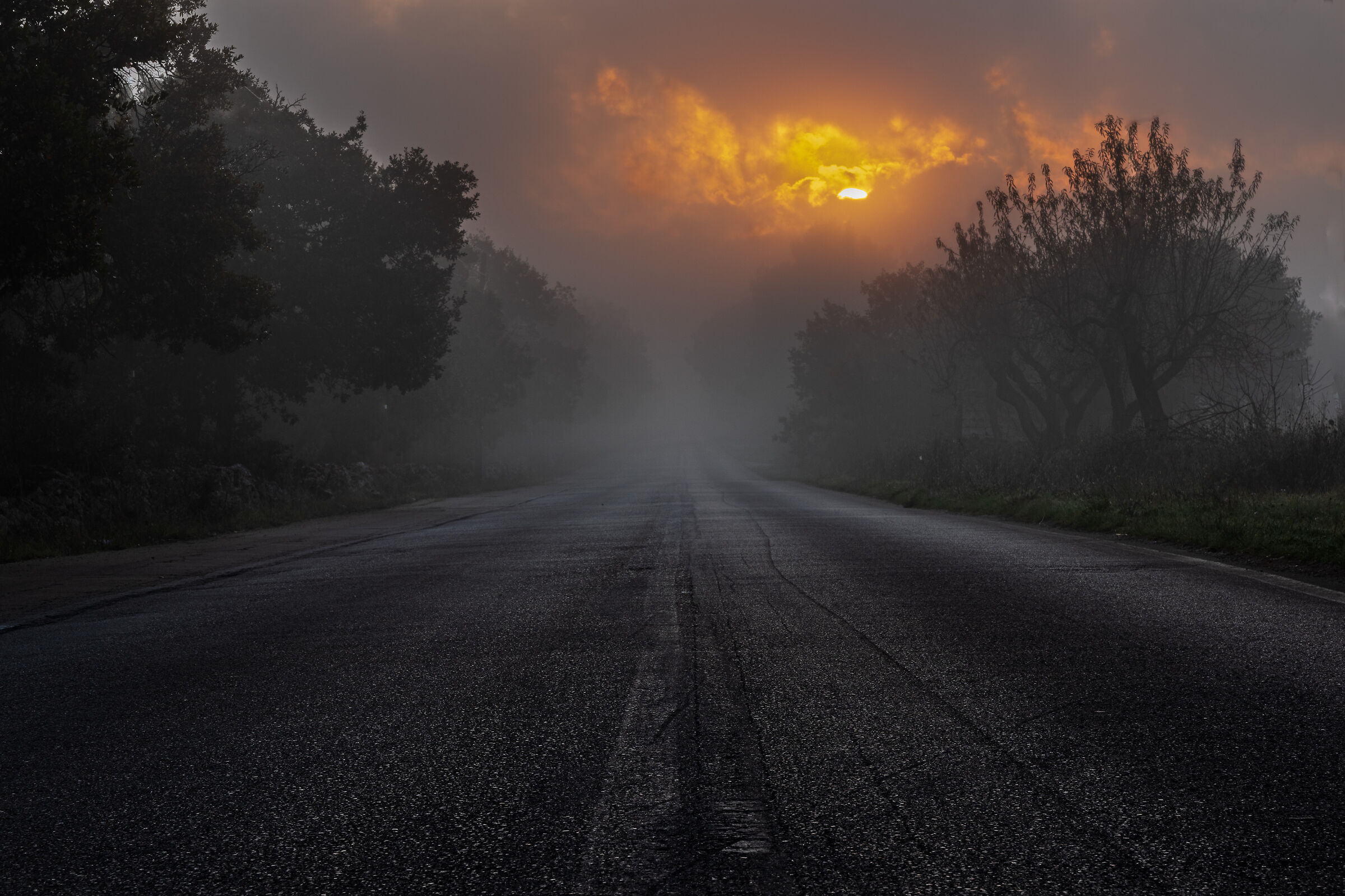 Alba tra Nuvole e Nebbia