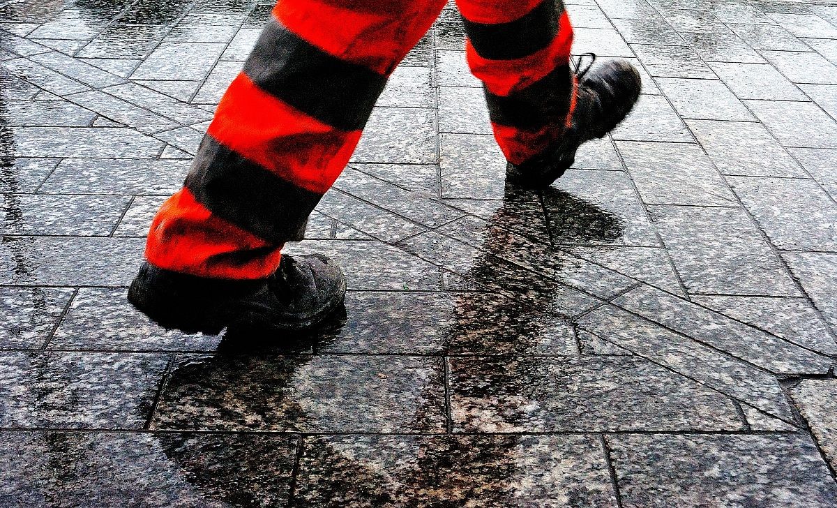 Standing on the sidewalk wet IV