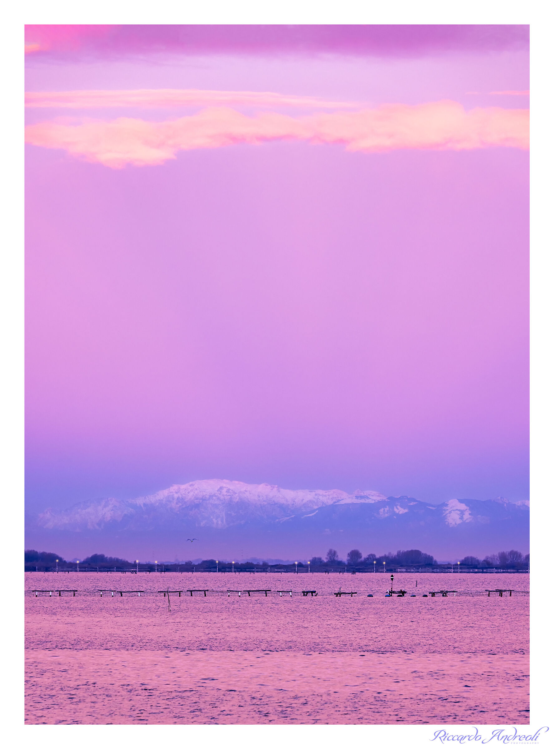 Venetian sunrise over the distant mountains