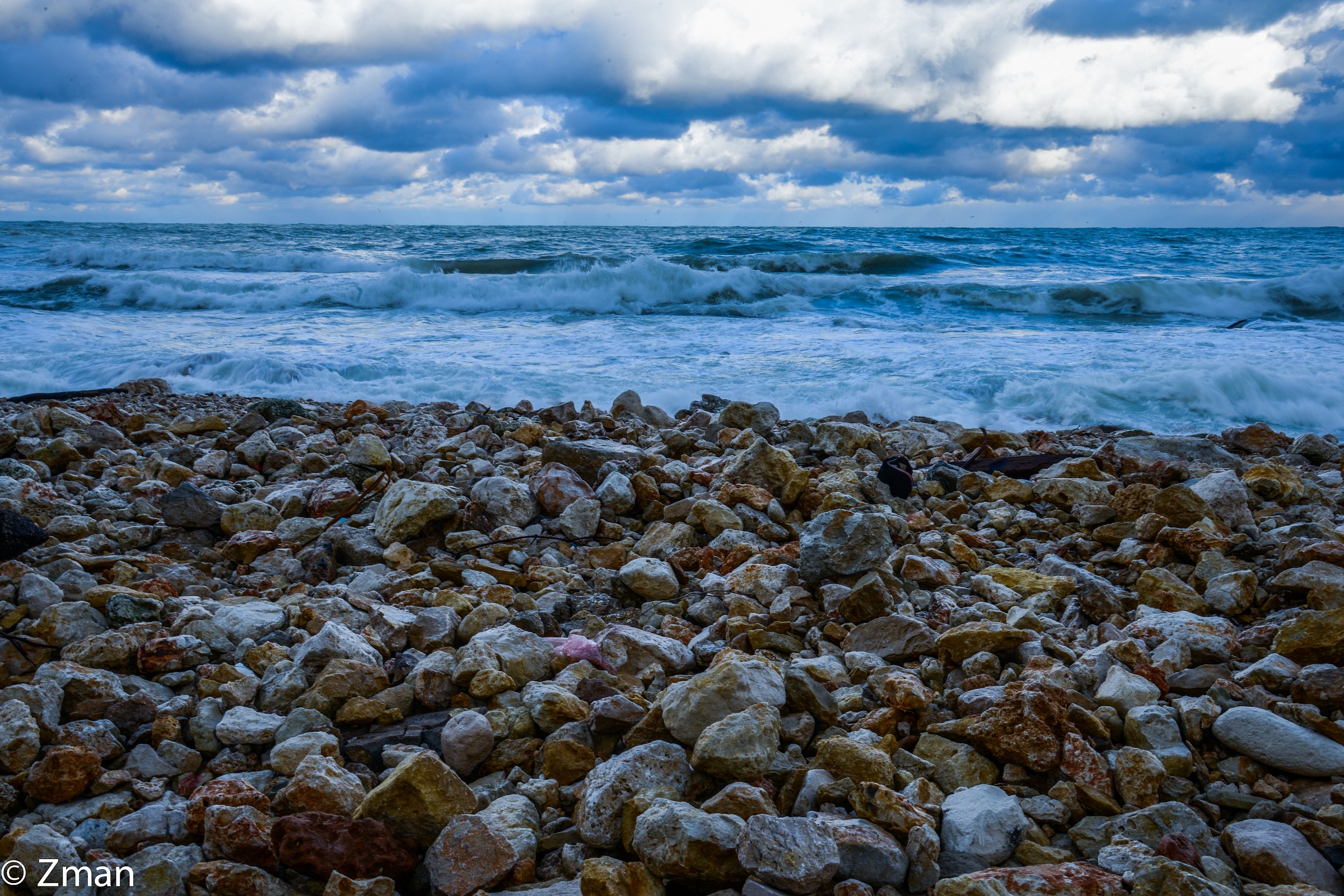 Rocks,waves and clouds