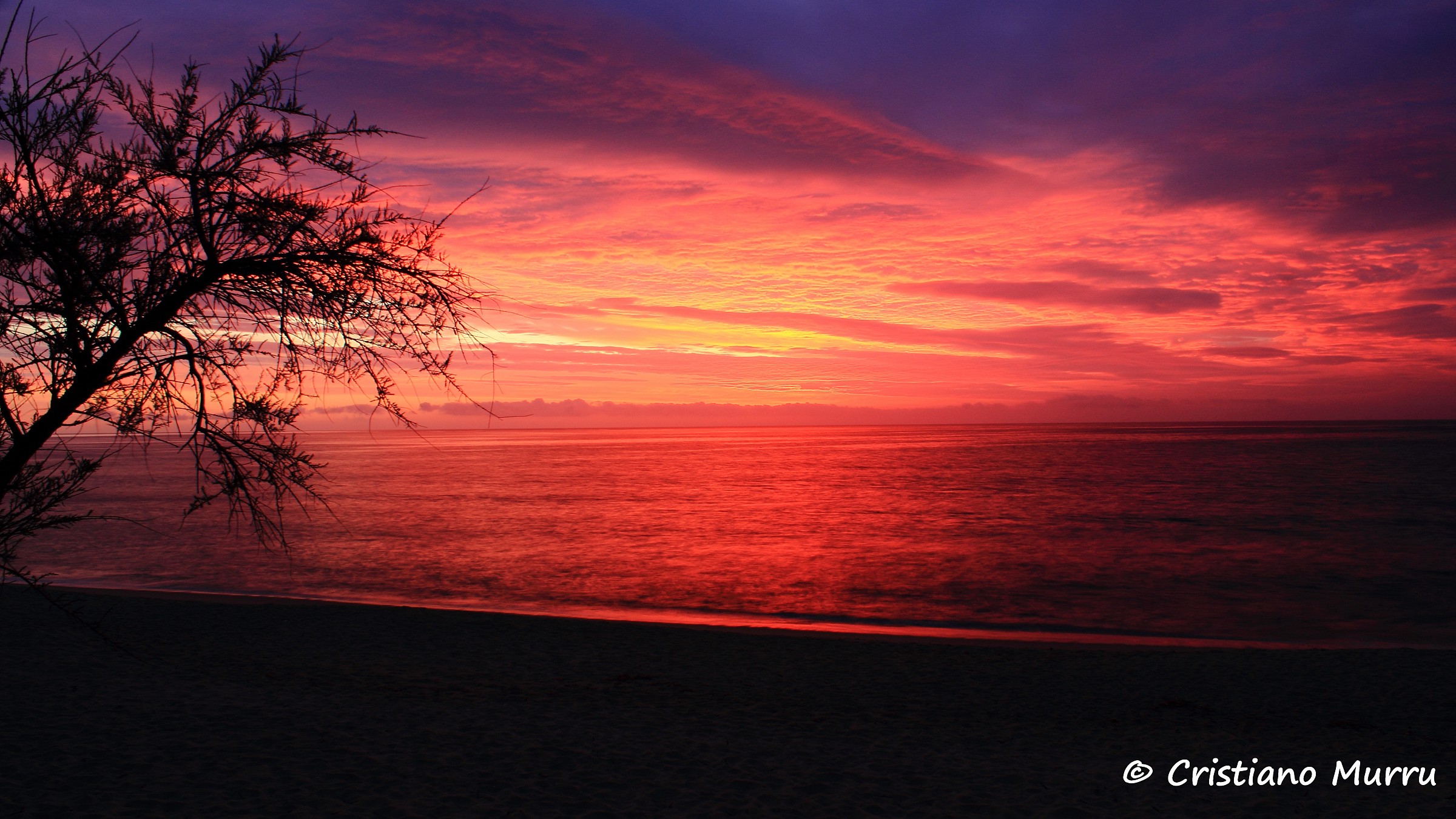 Alba sulla spiaggia di Sanpietro,Castiadas