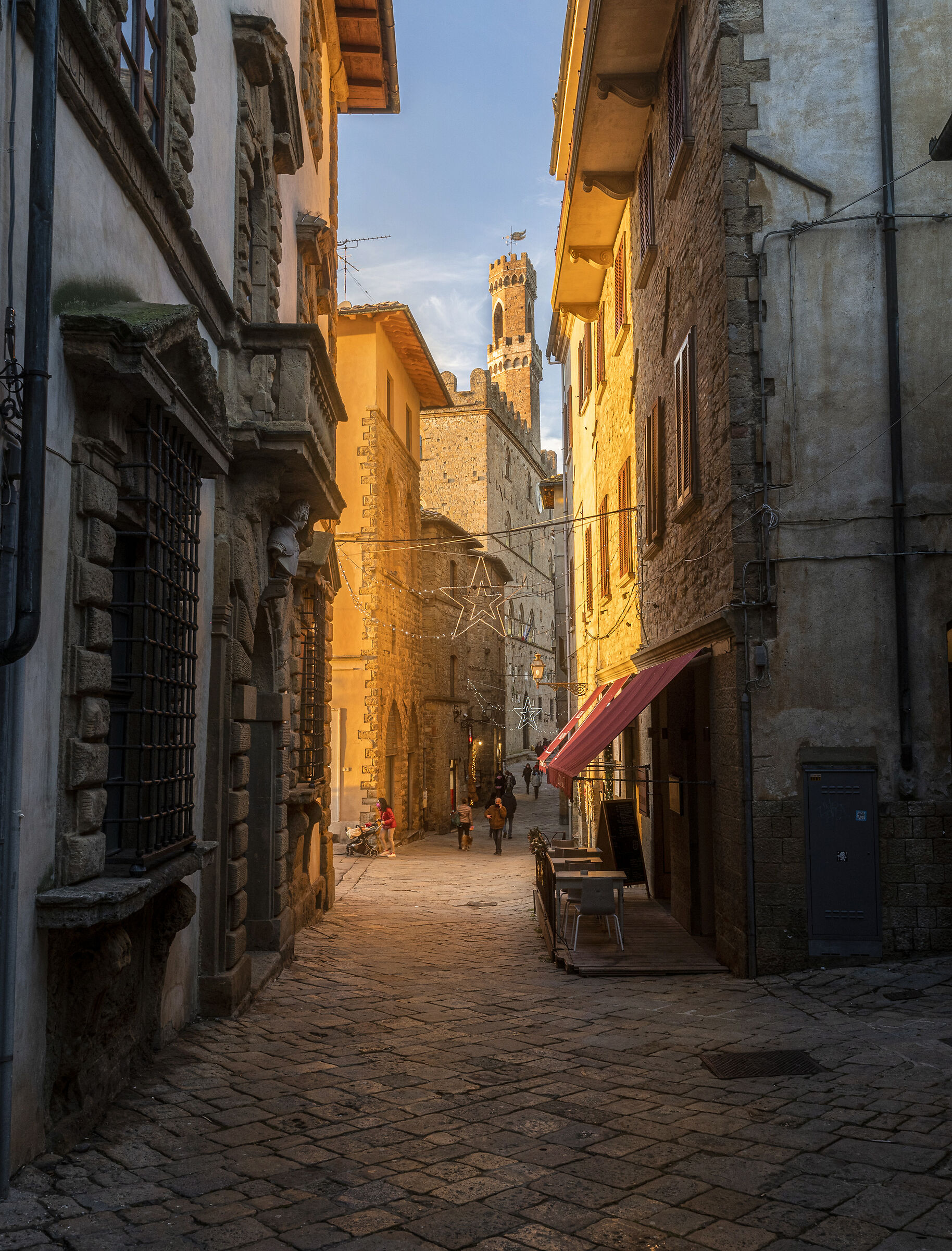Golden hour in the streets of Volterra