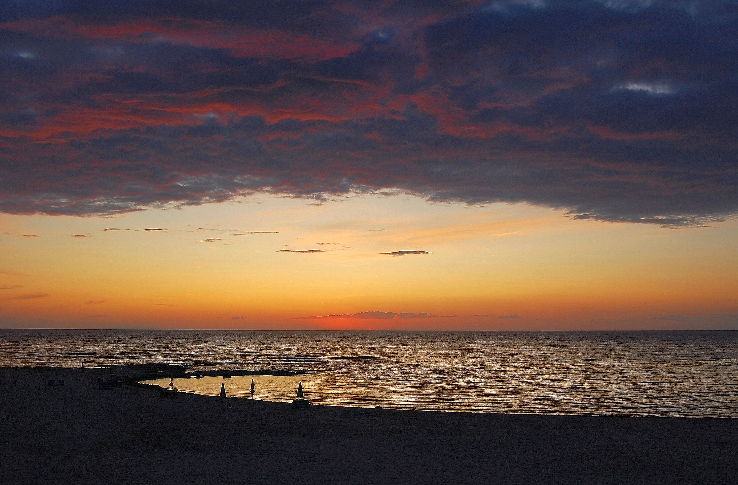 Last lights on the bay of Rivabella di Gallipoli