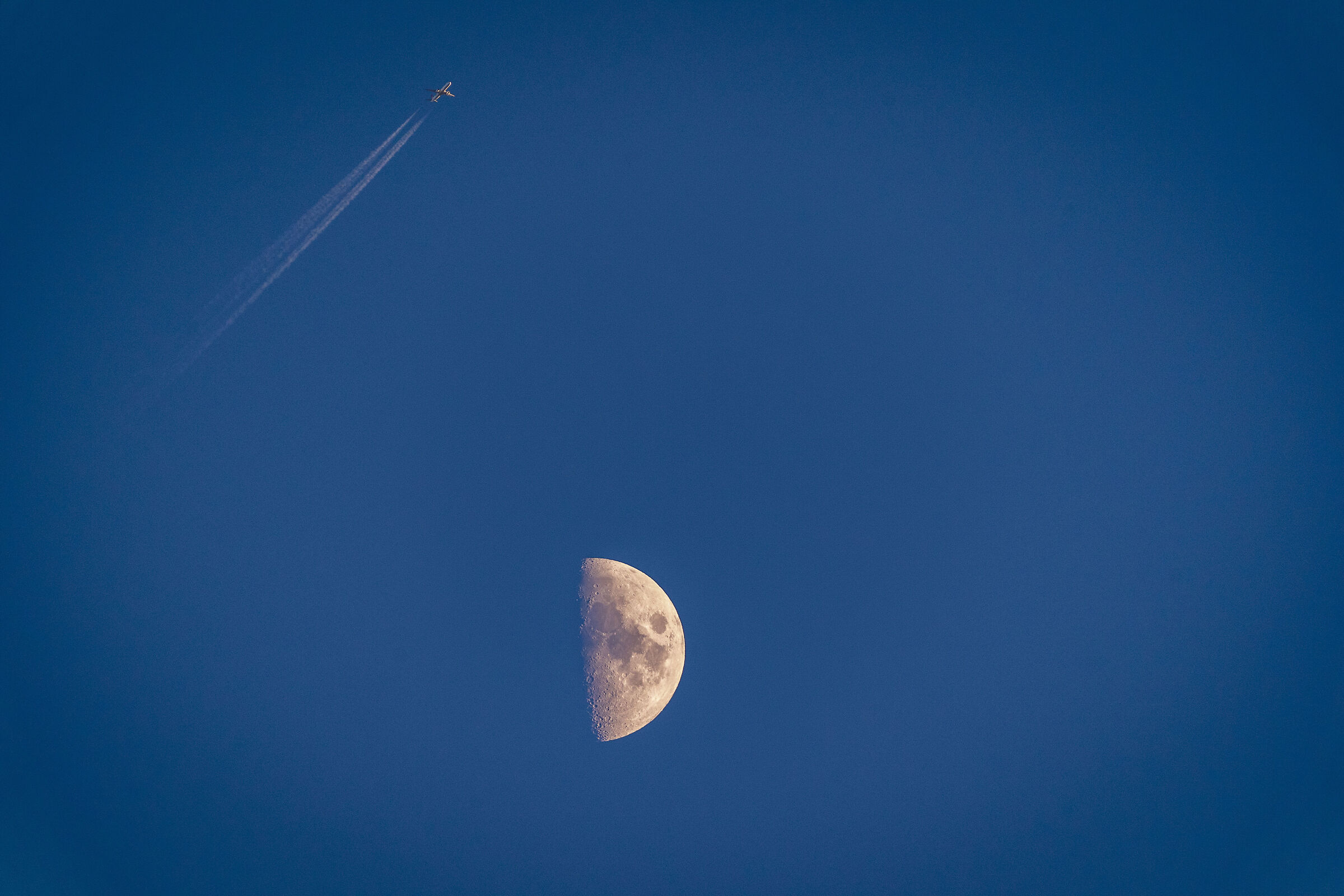 Plane and moon