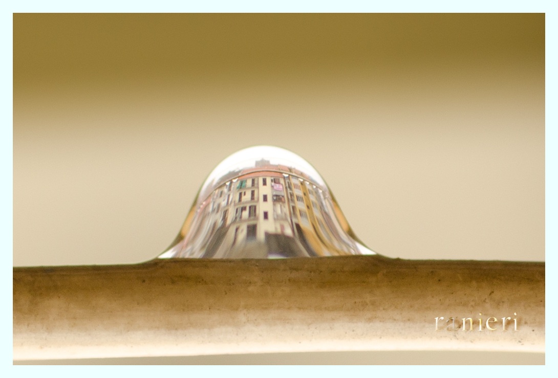 buildings across the water droplet