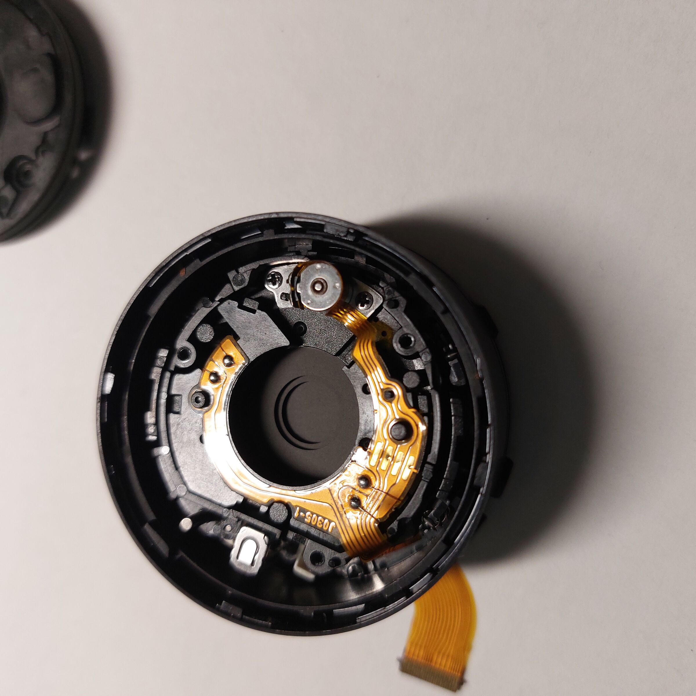 tendina diaframma sotto lente frontale