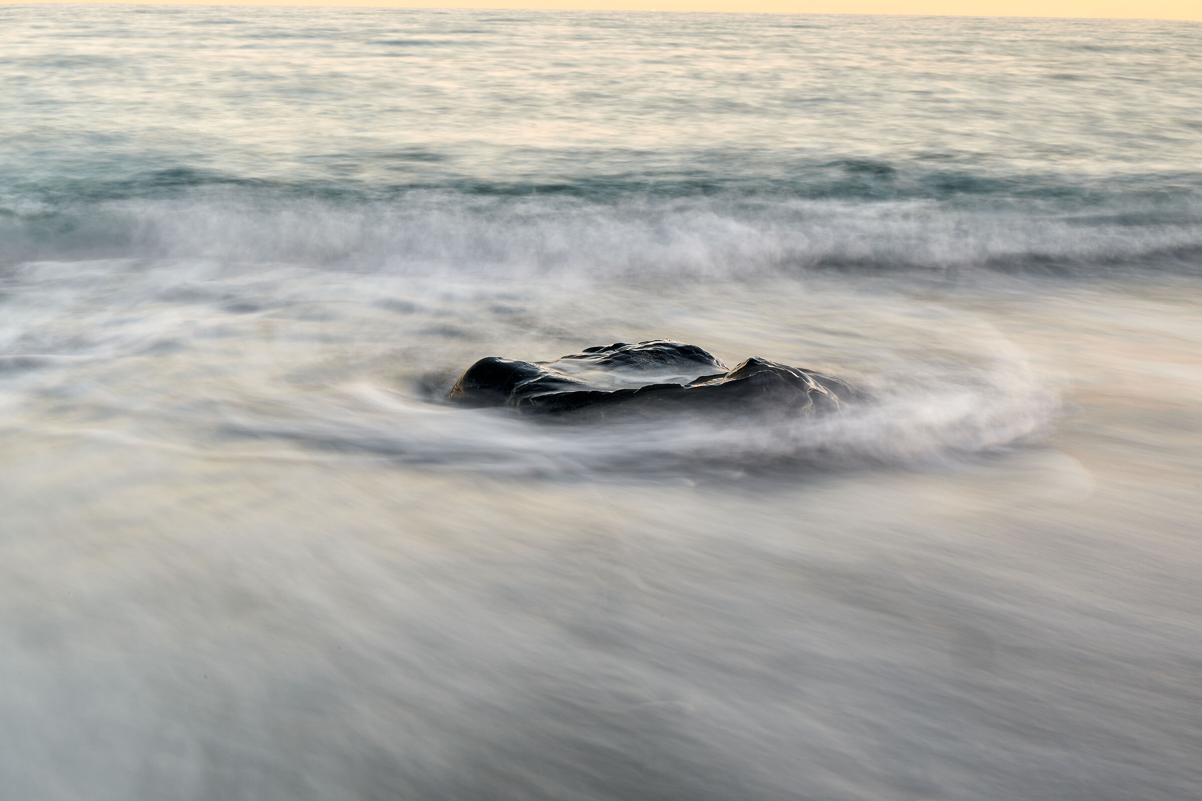 How can a rock stem the sea