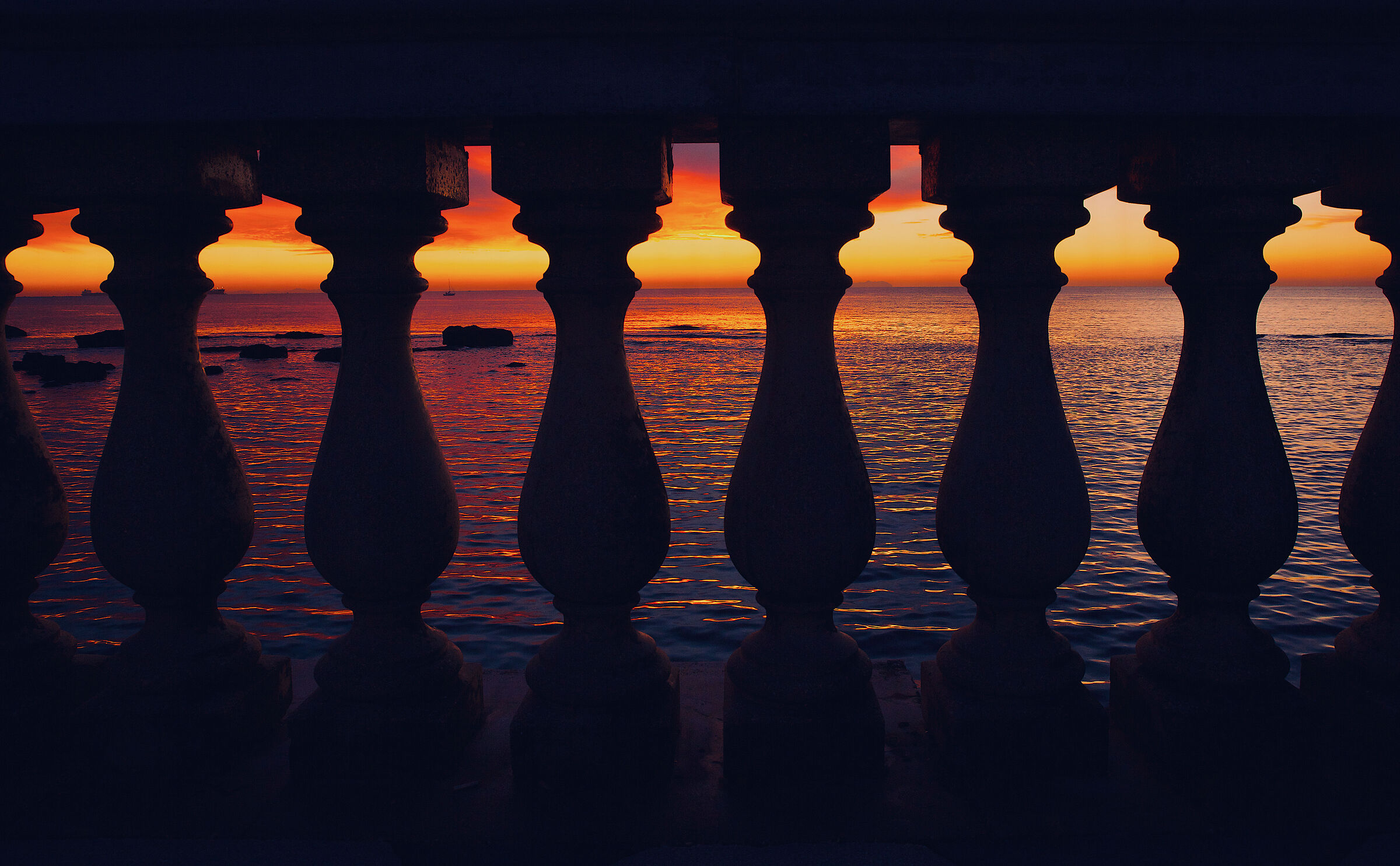 As if the sea, the sunset were framed