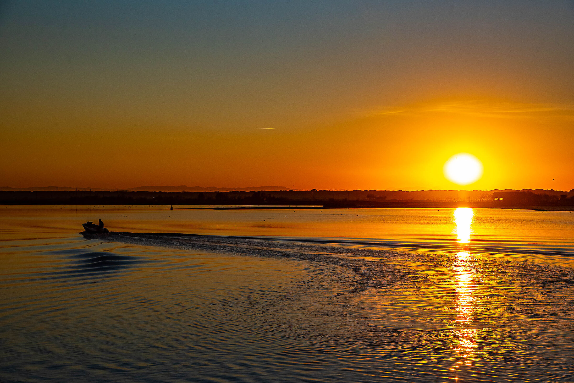 pescatori al tramonto