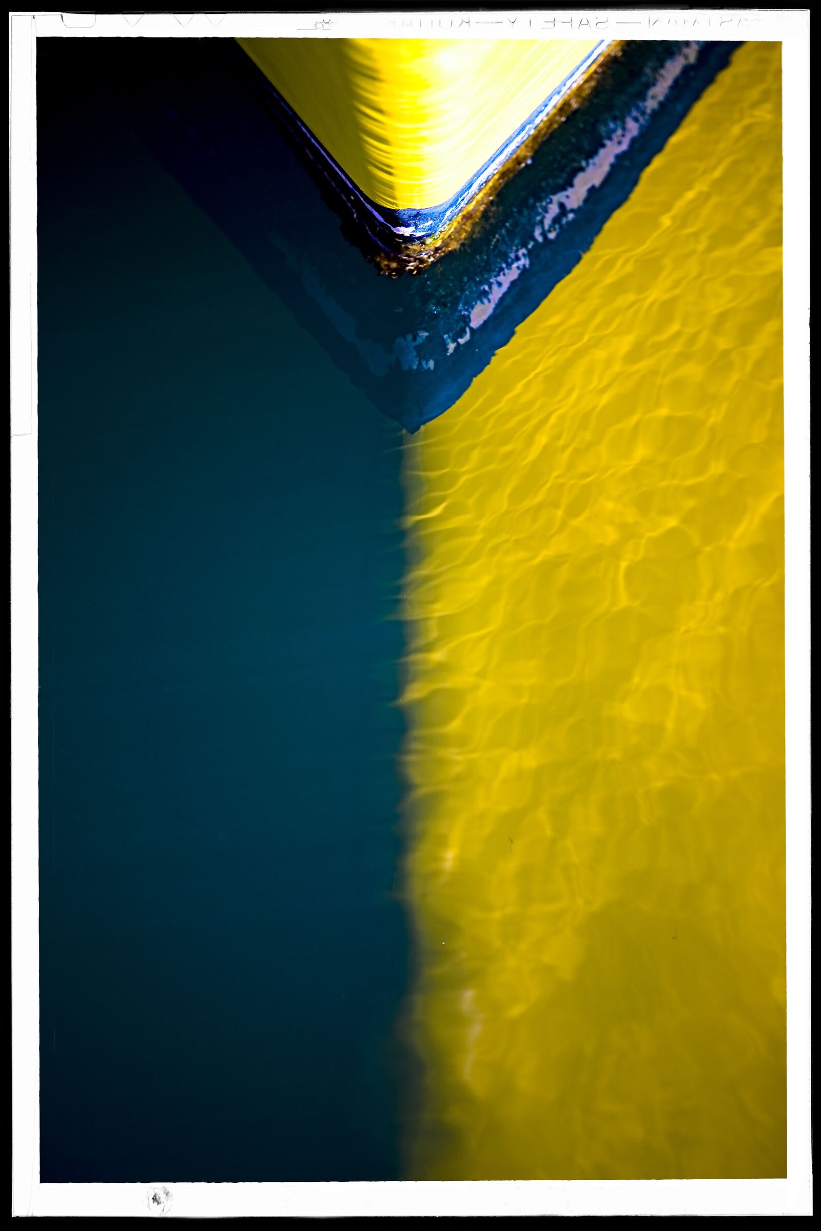 yellow boat reflection