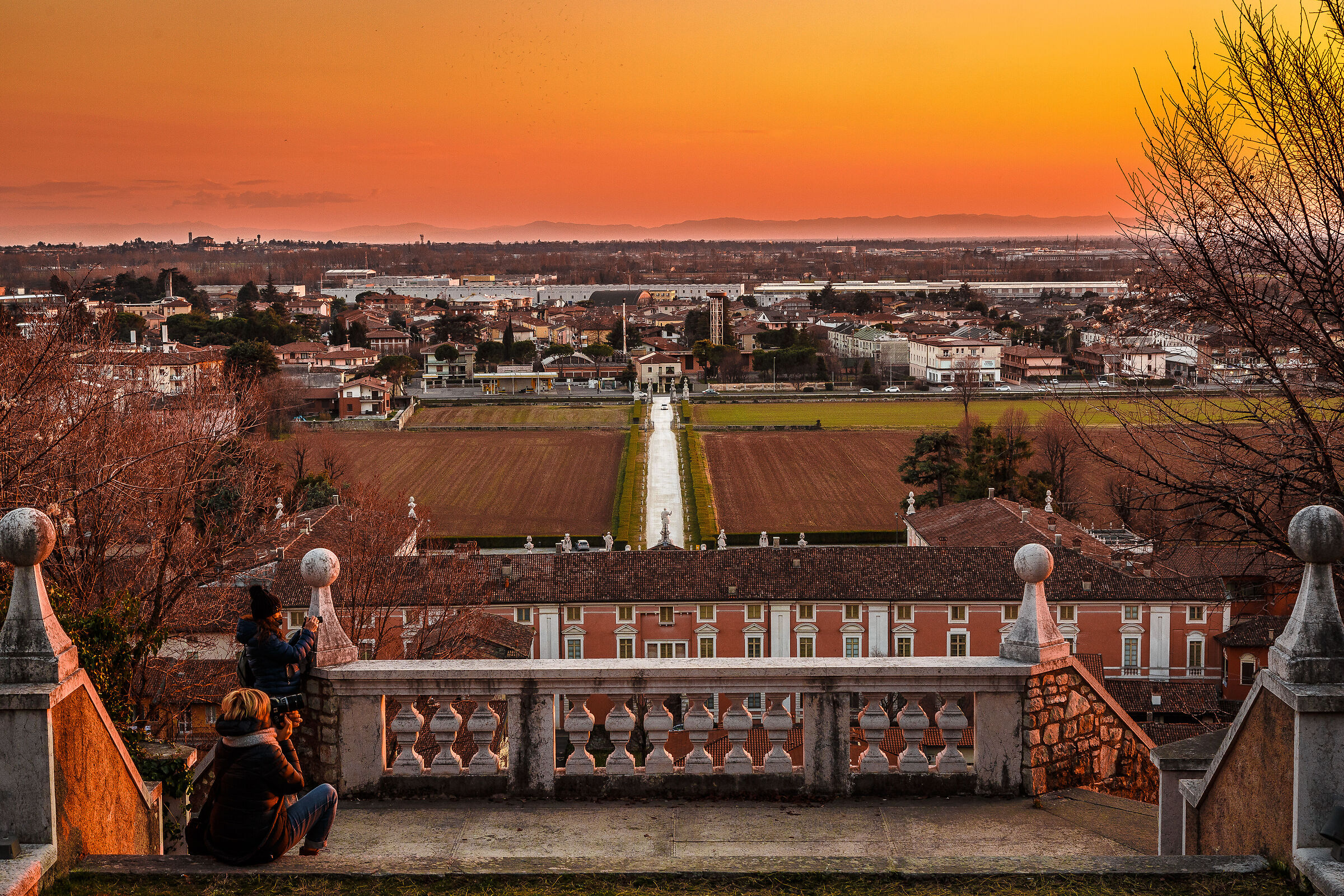 Photographers at sunset