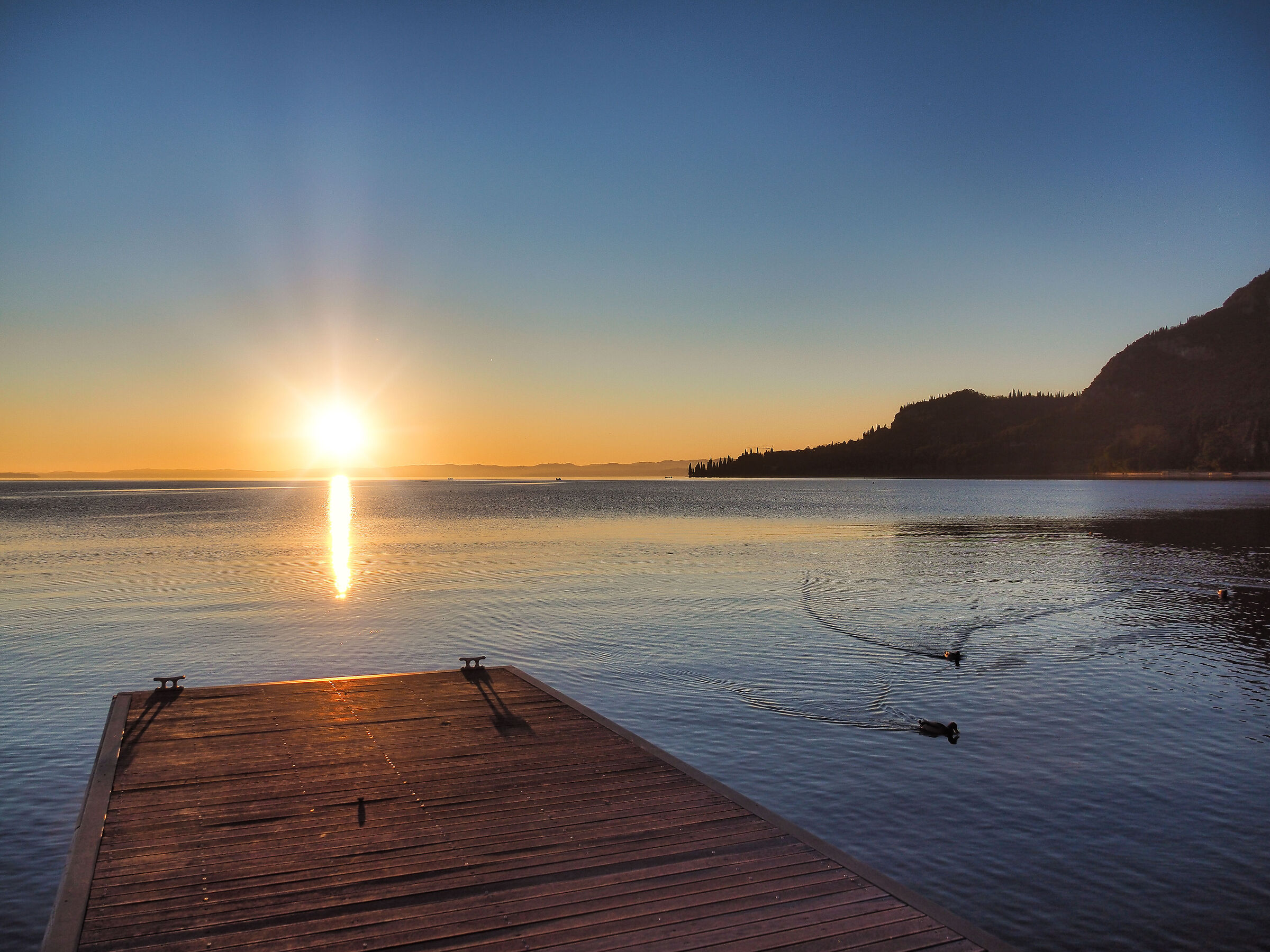 the serenity of the sunset on the pier