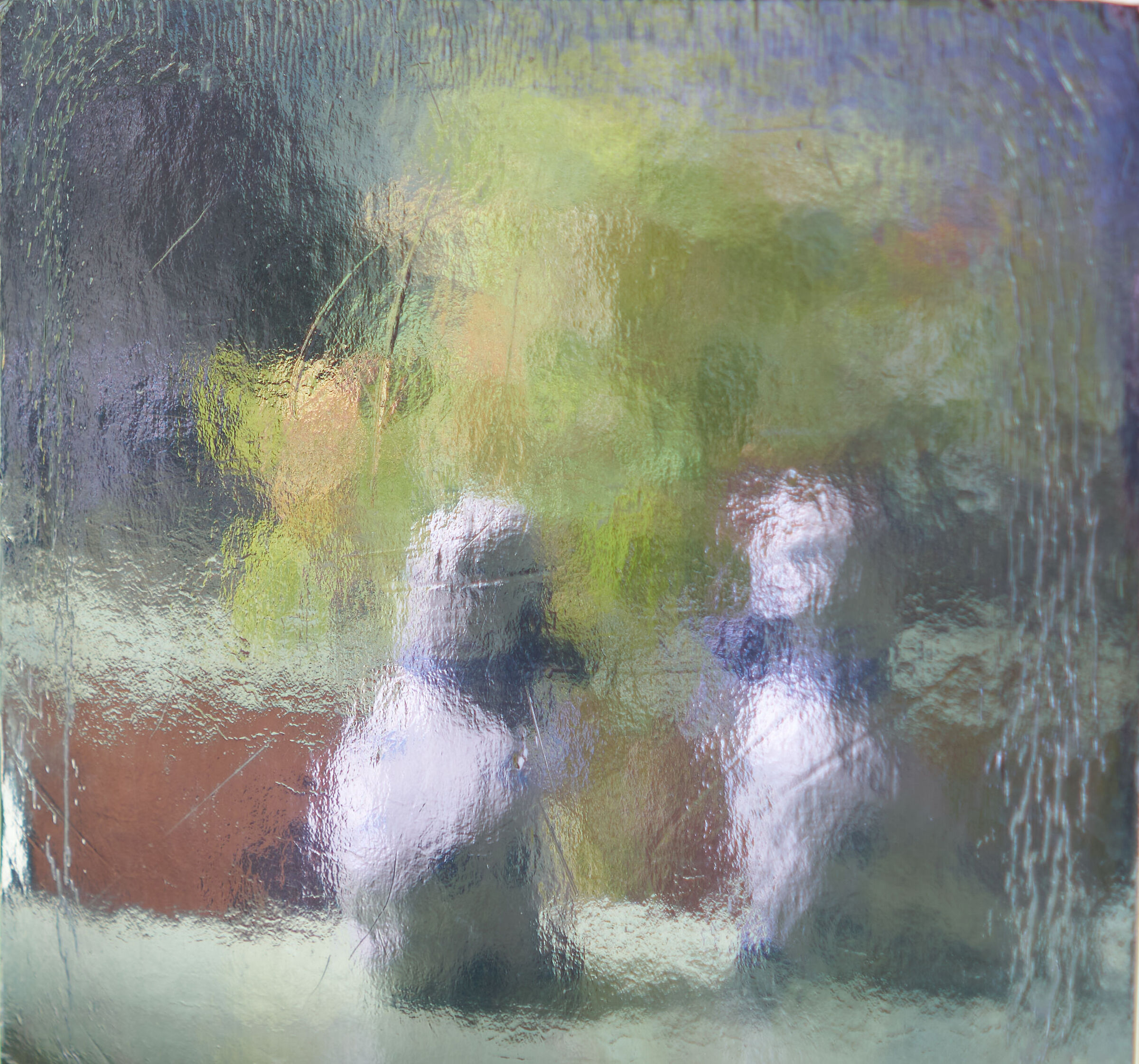 Reflection of ceramic ducklings on tray c/p81
