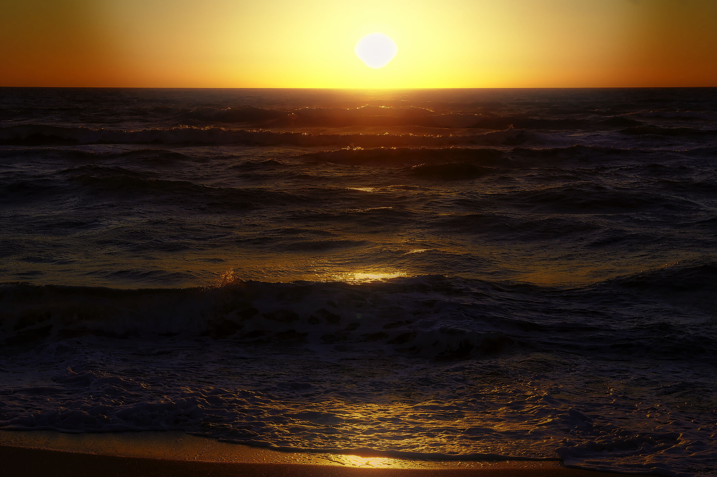 Rippling sea at sunset