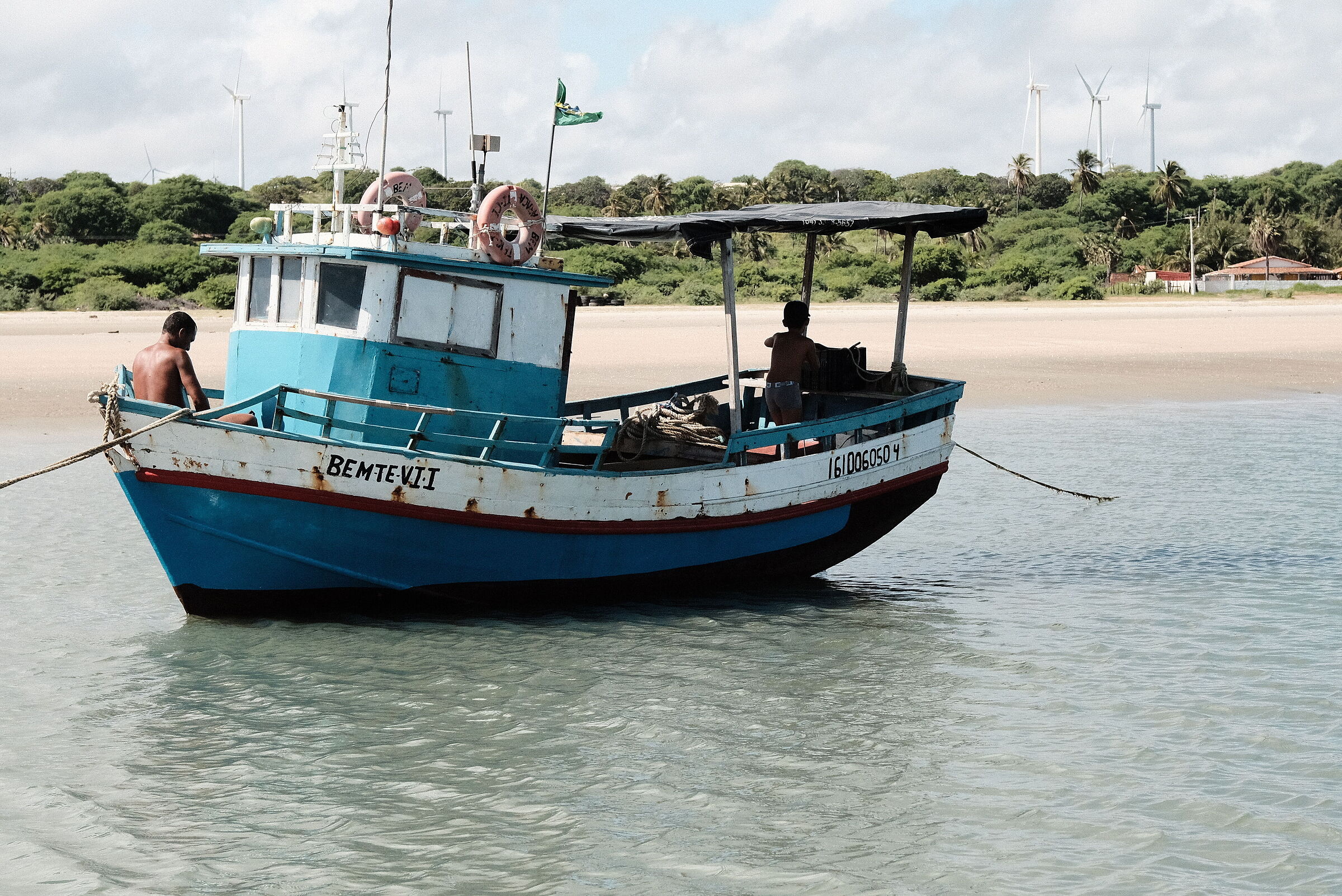 Small sailor on small boat