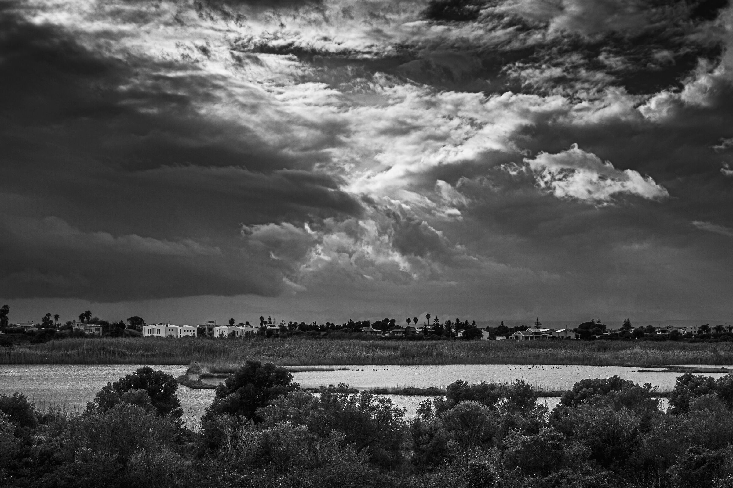 Interweaving of Clouds from the Salt Pans of Syracuse