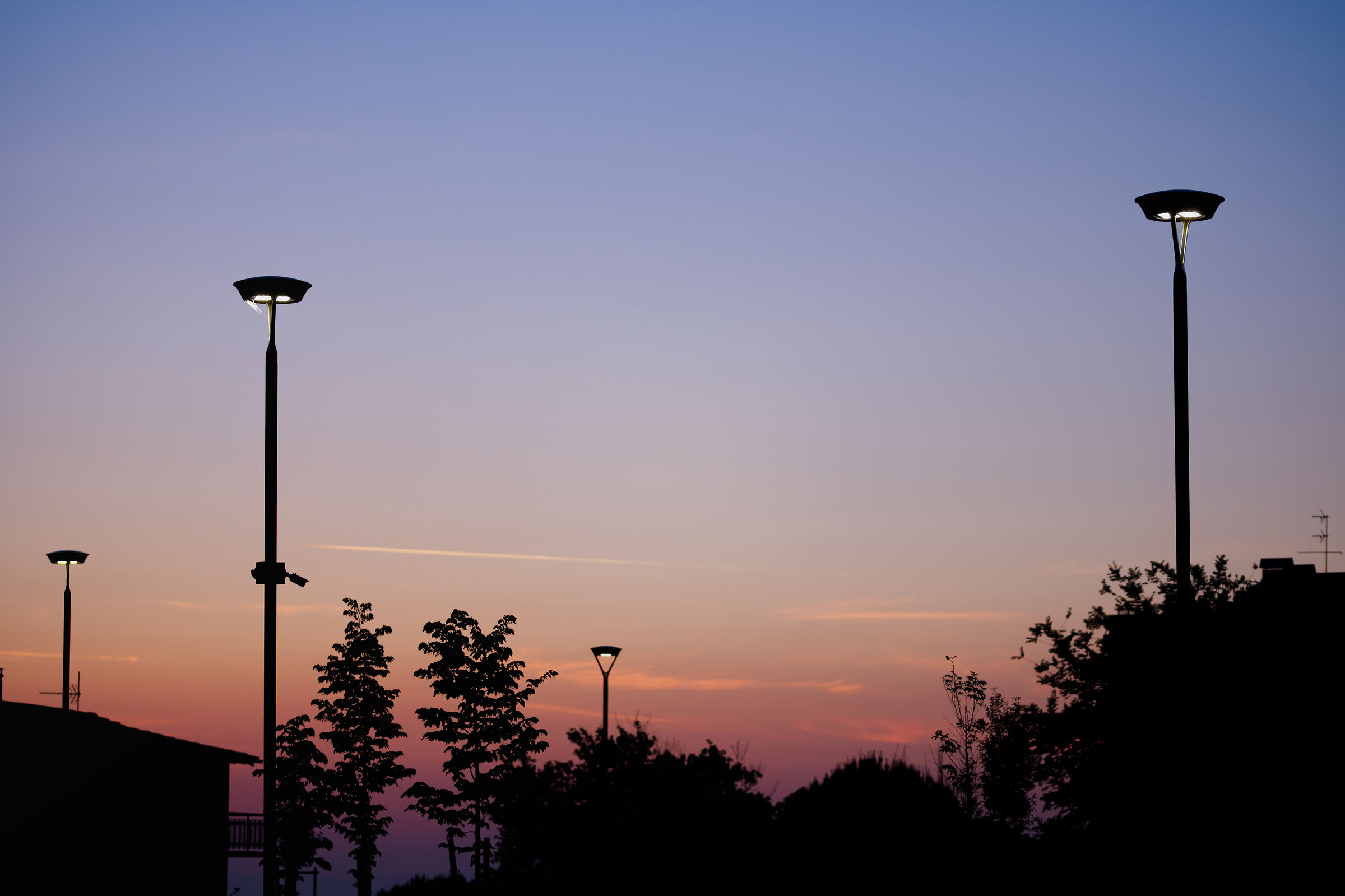 Sunrise on the street lamps