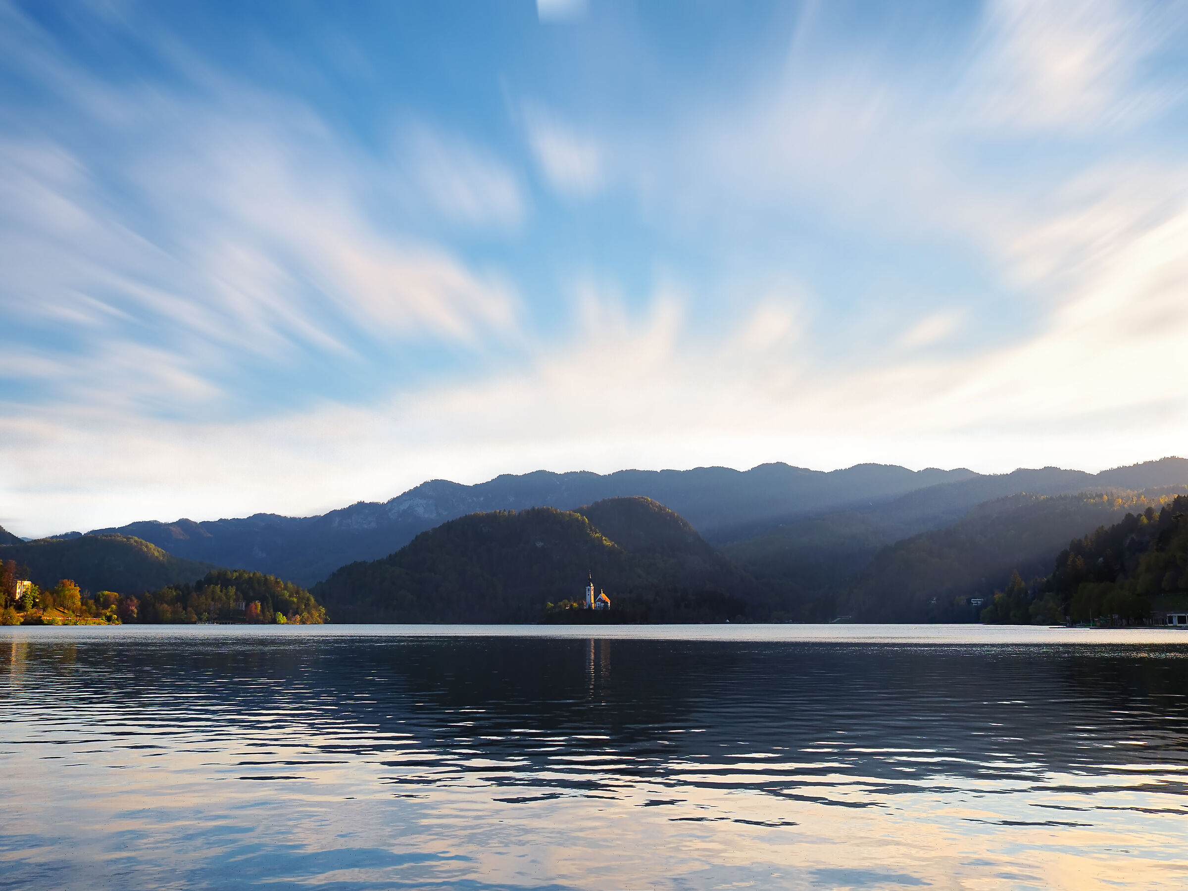 last rays of sunshine on the island of Lake Bled