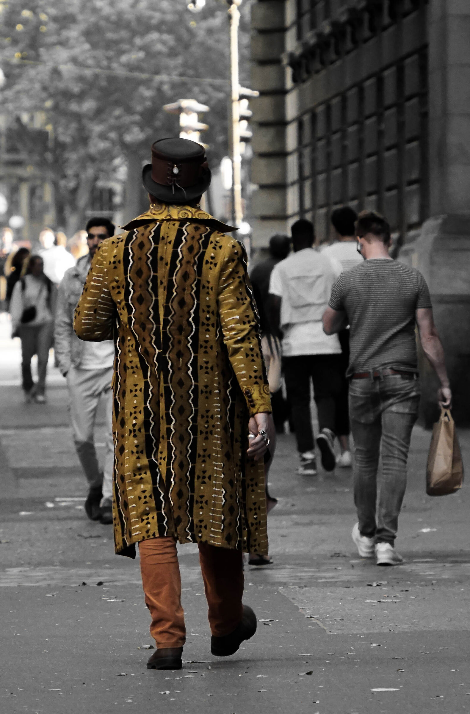 A dude in a jacket and hat