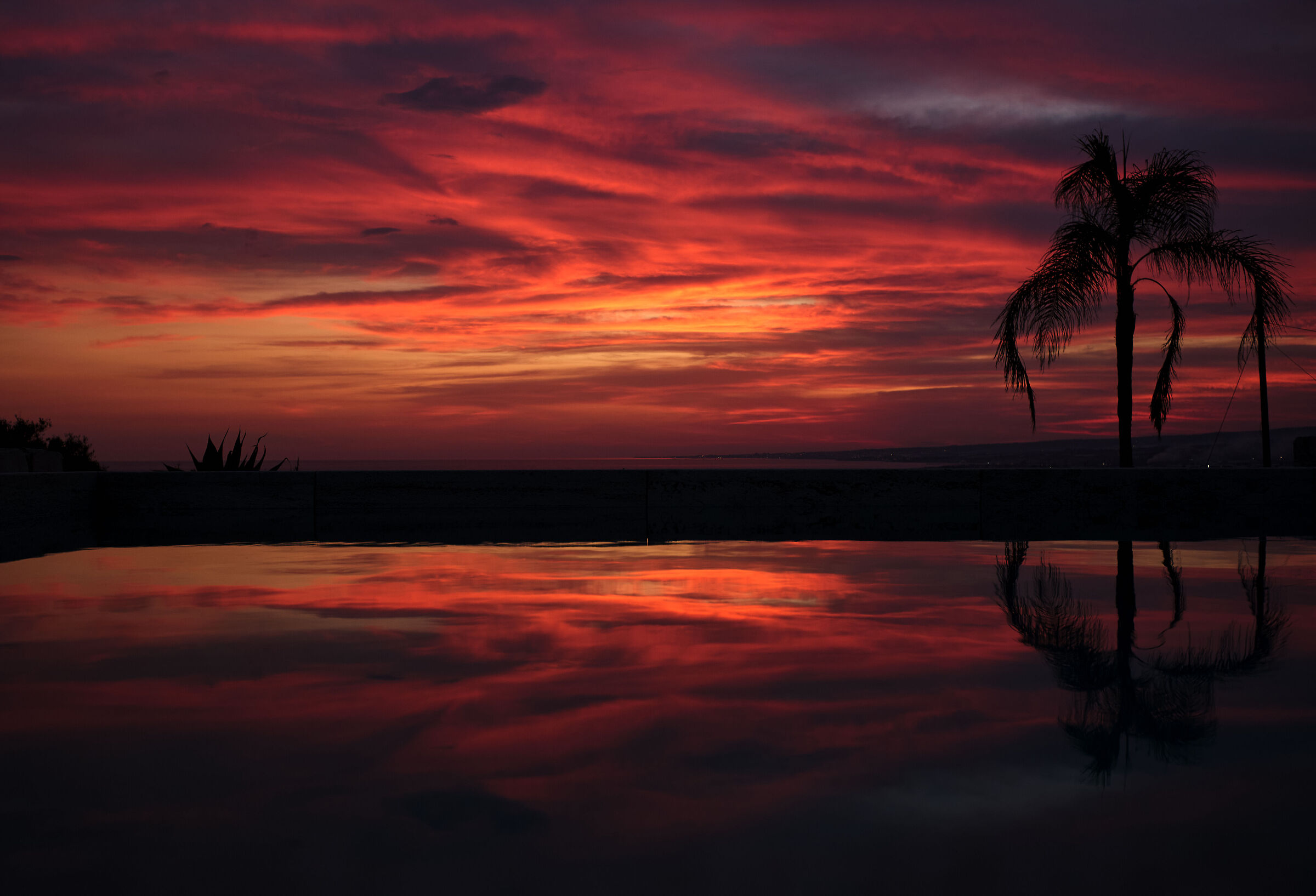 sunset on swimming pool