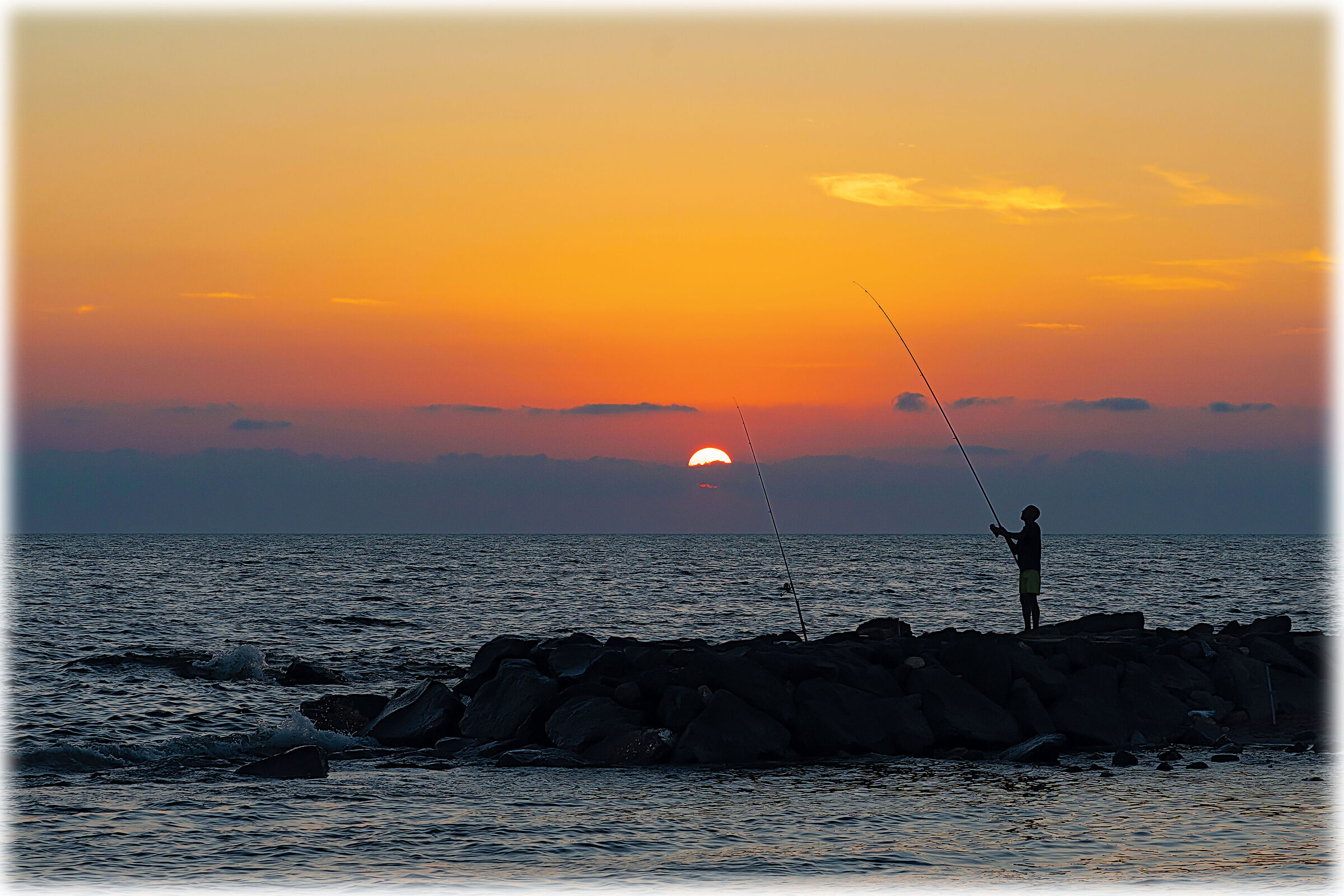 fishing... of the sunset