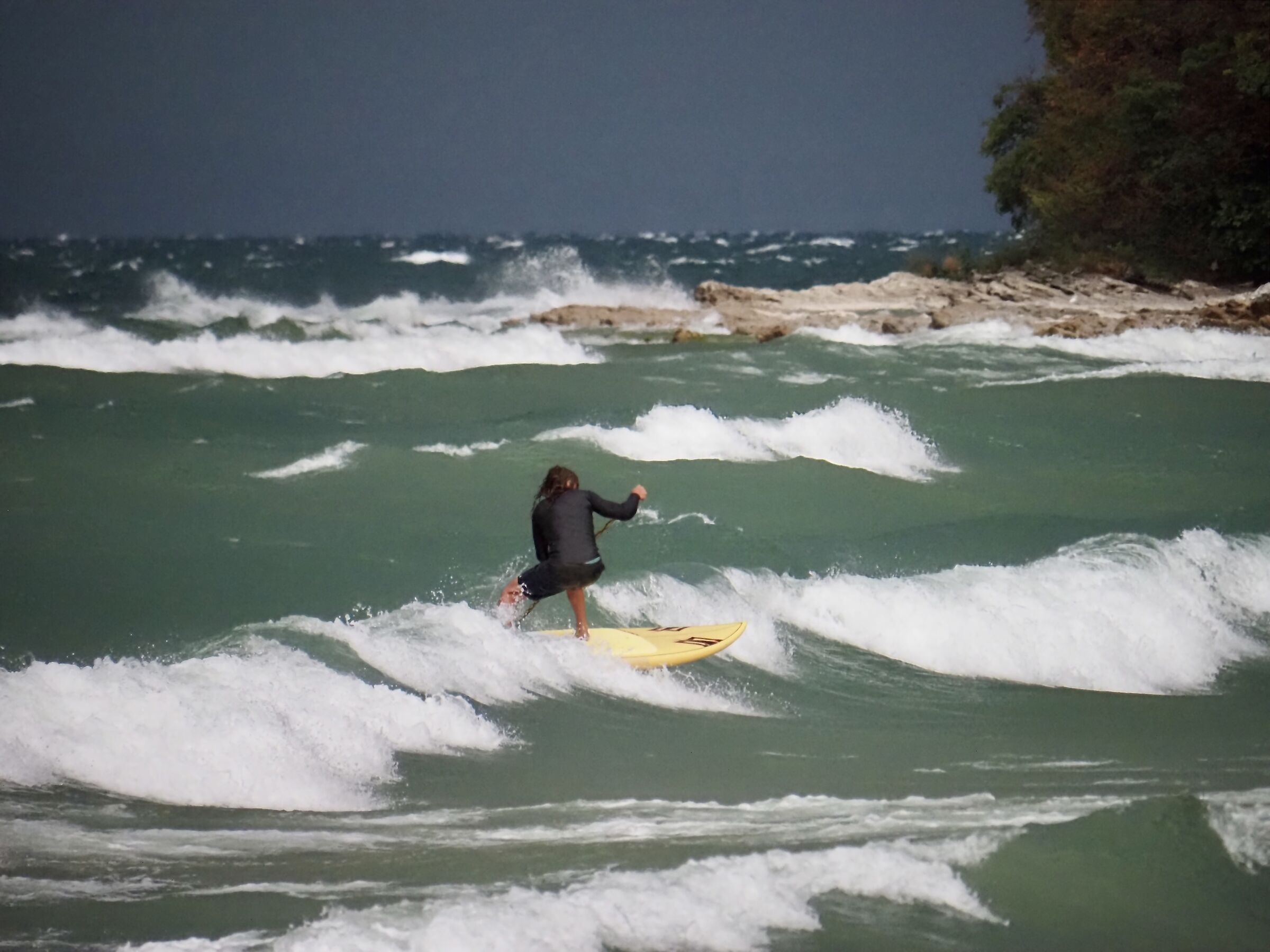 Il surfista e la pagaia