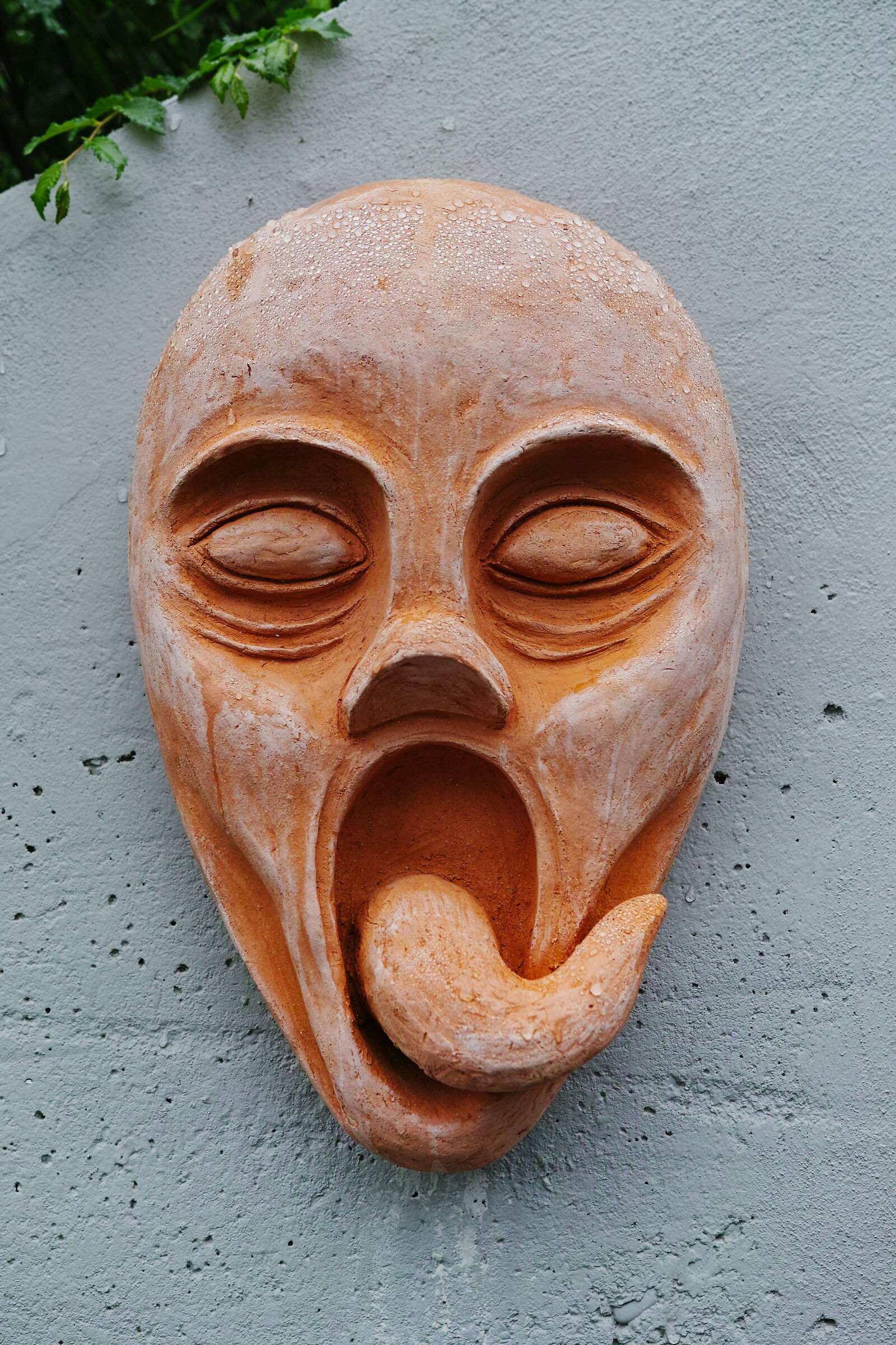 Maschera in terracotta