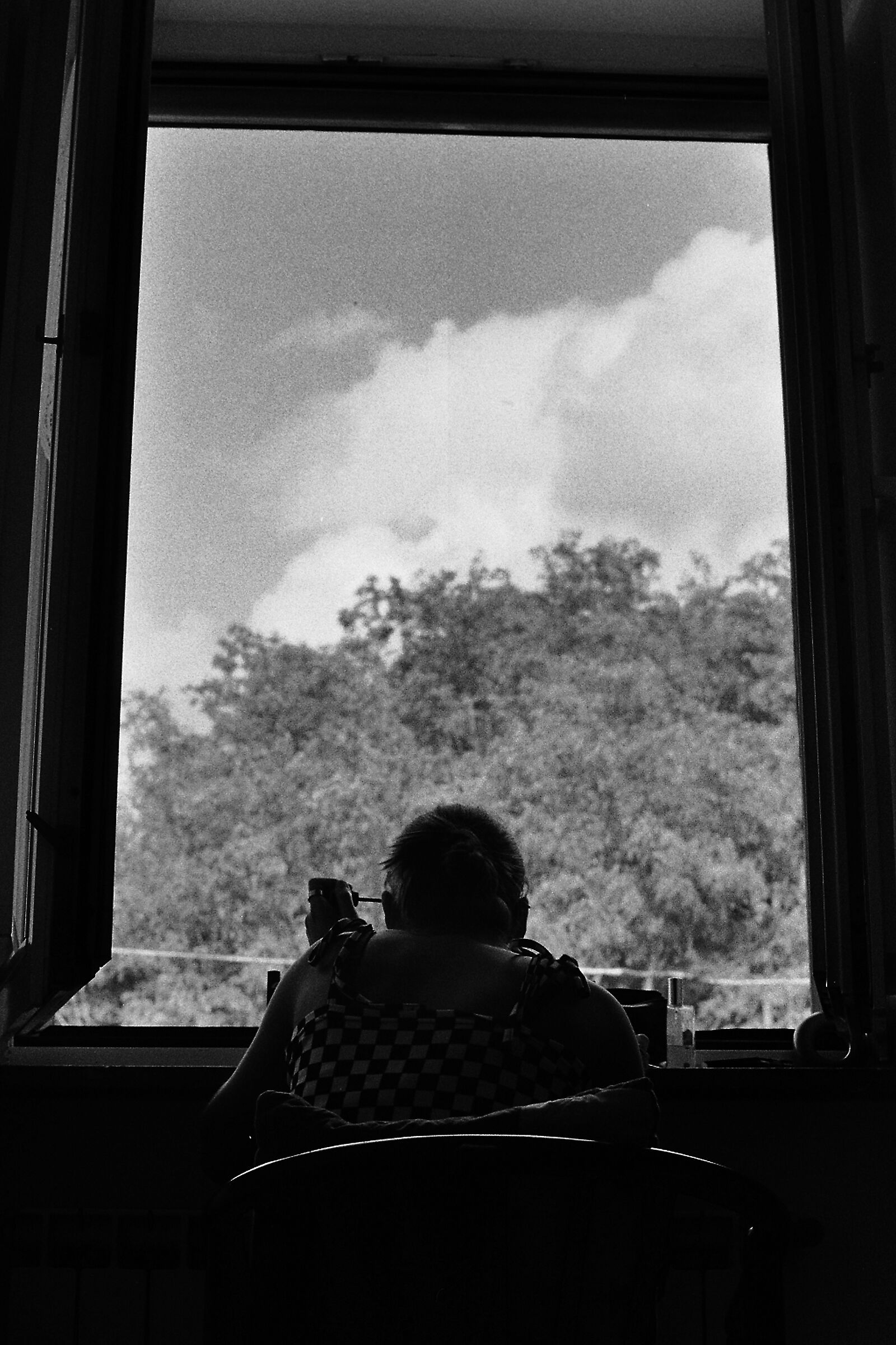 At the window
