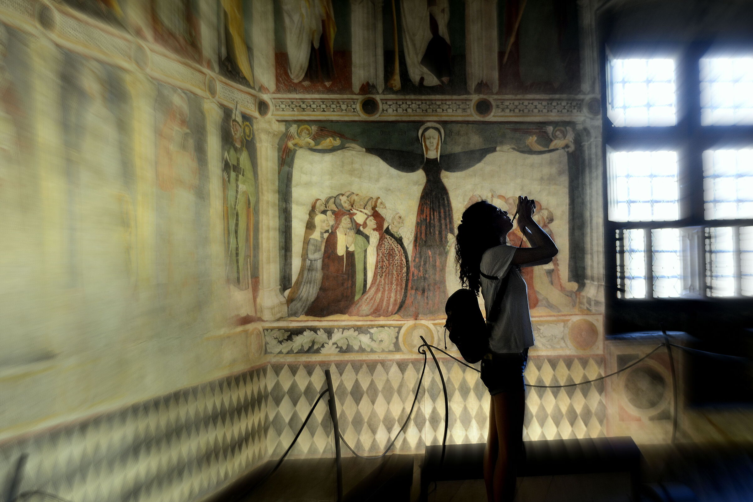 Castle of Fenis, interiors with ... daughter in silhoutte