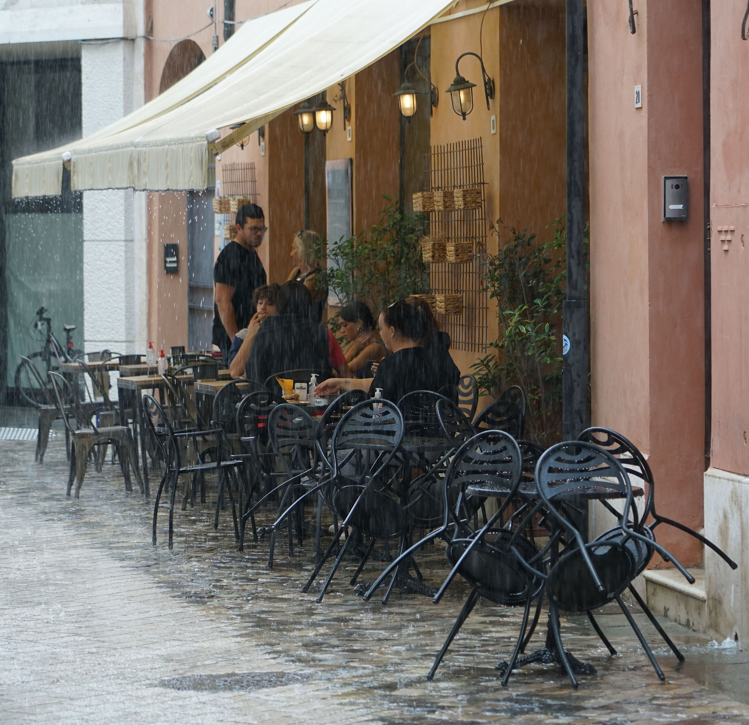 At the bar in the rain.