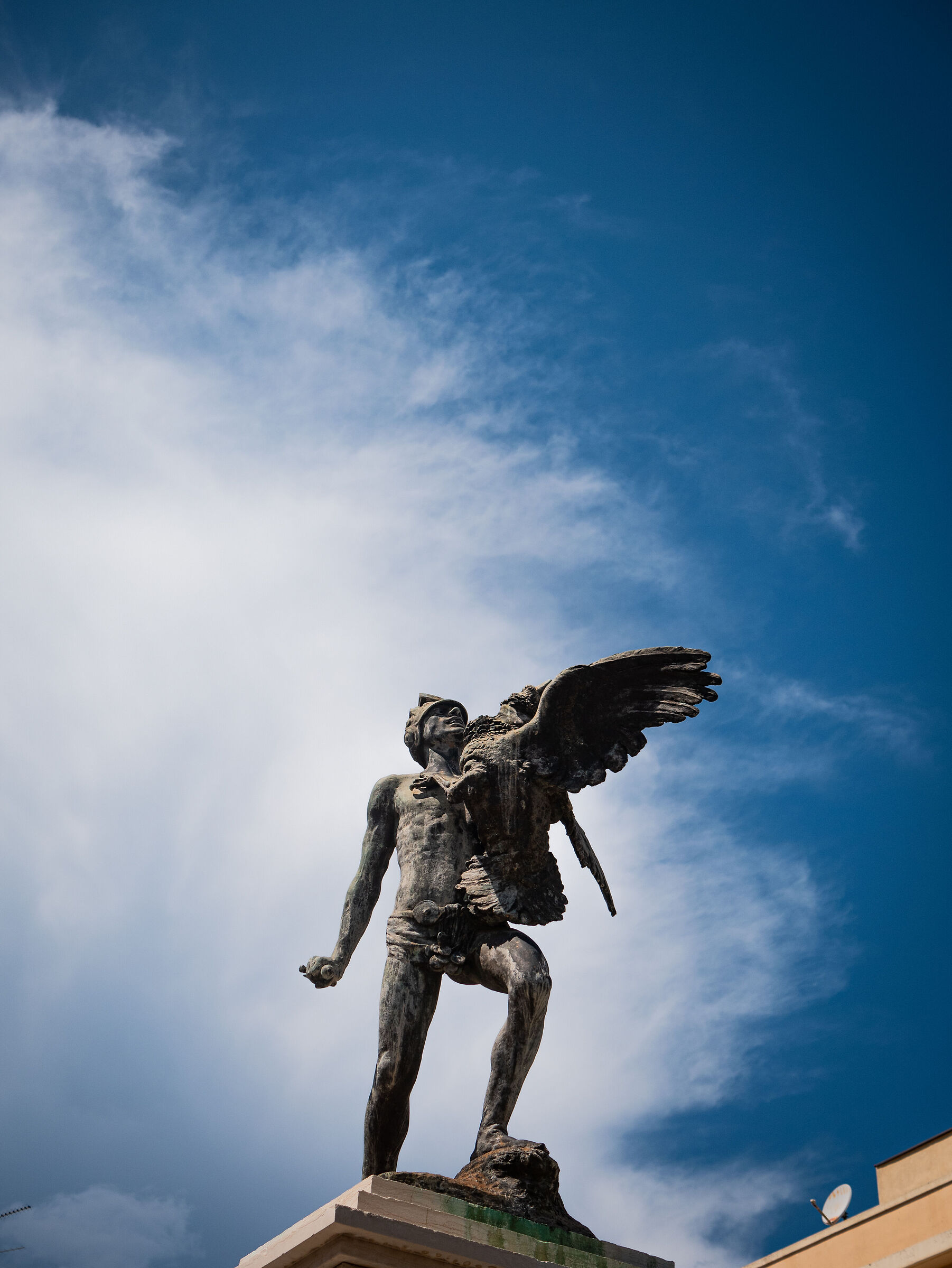 Statue of man and bird