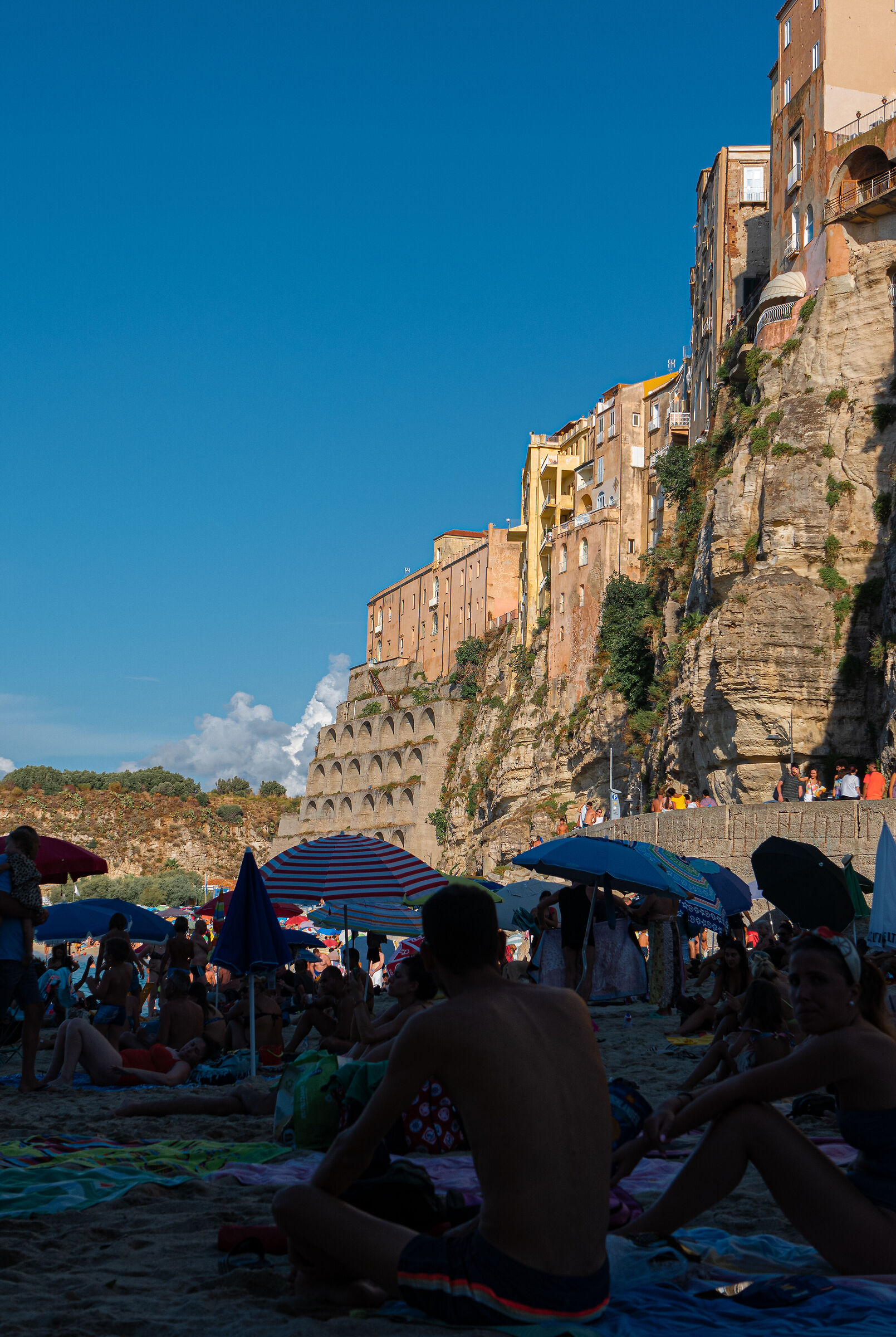 Tropea from below with beach and mountain