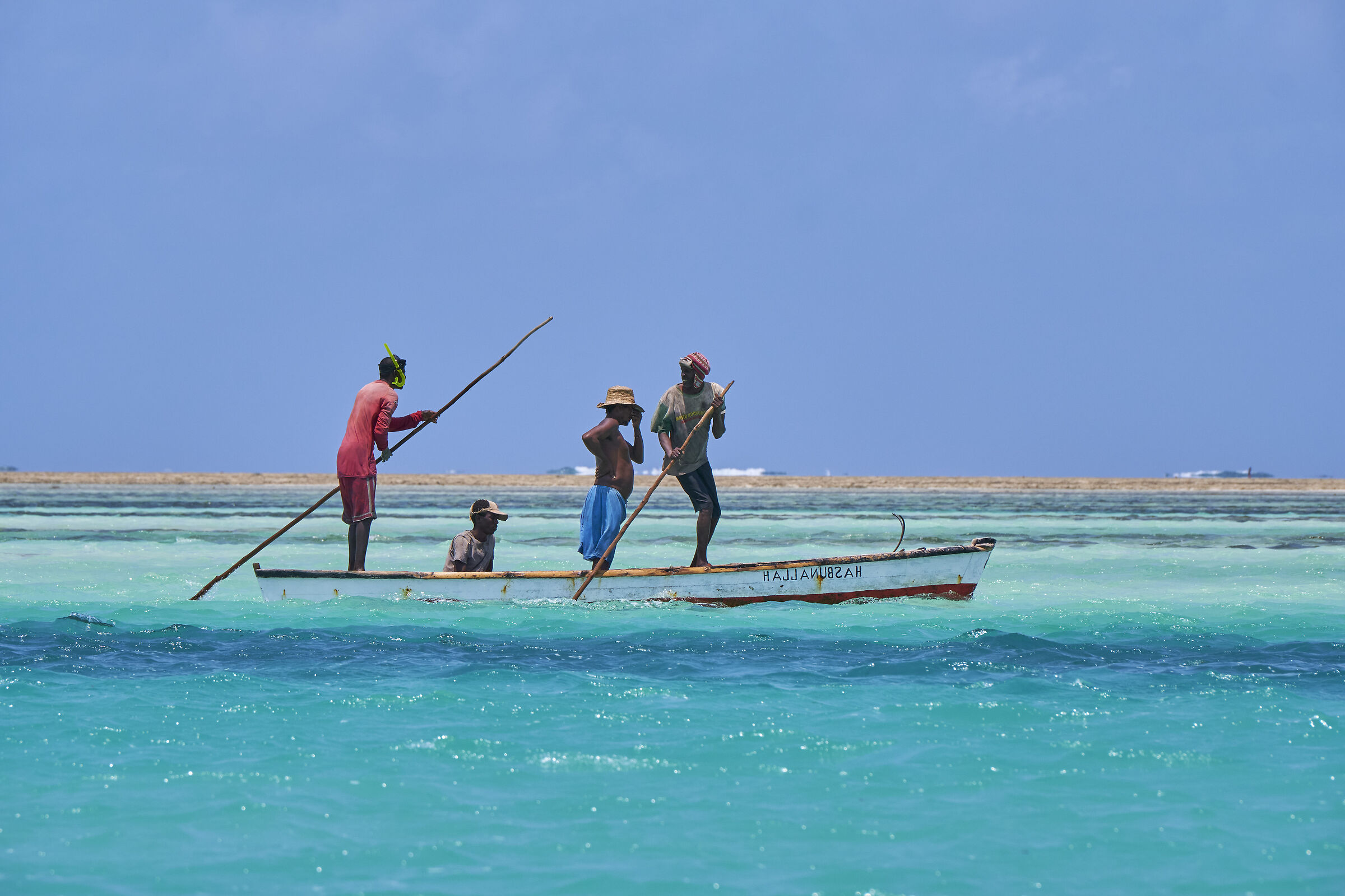 Pescatori nella bassa marea